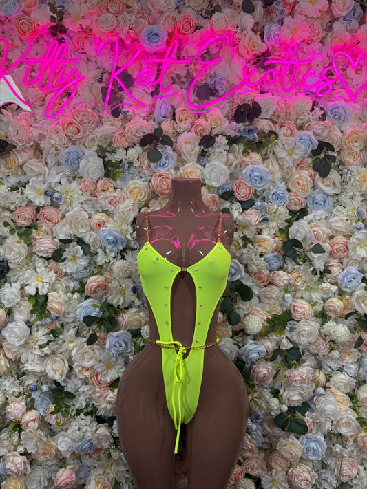 Neon green cutout one-piece dance bodysuit with strappy neckline and thong legs