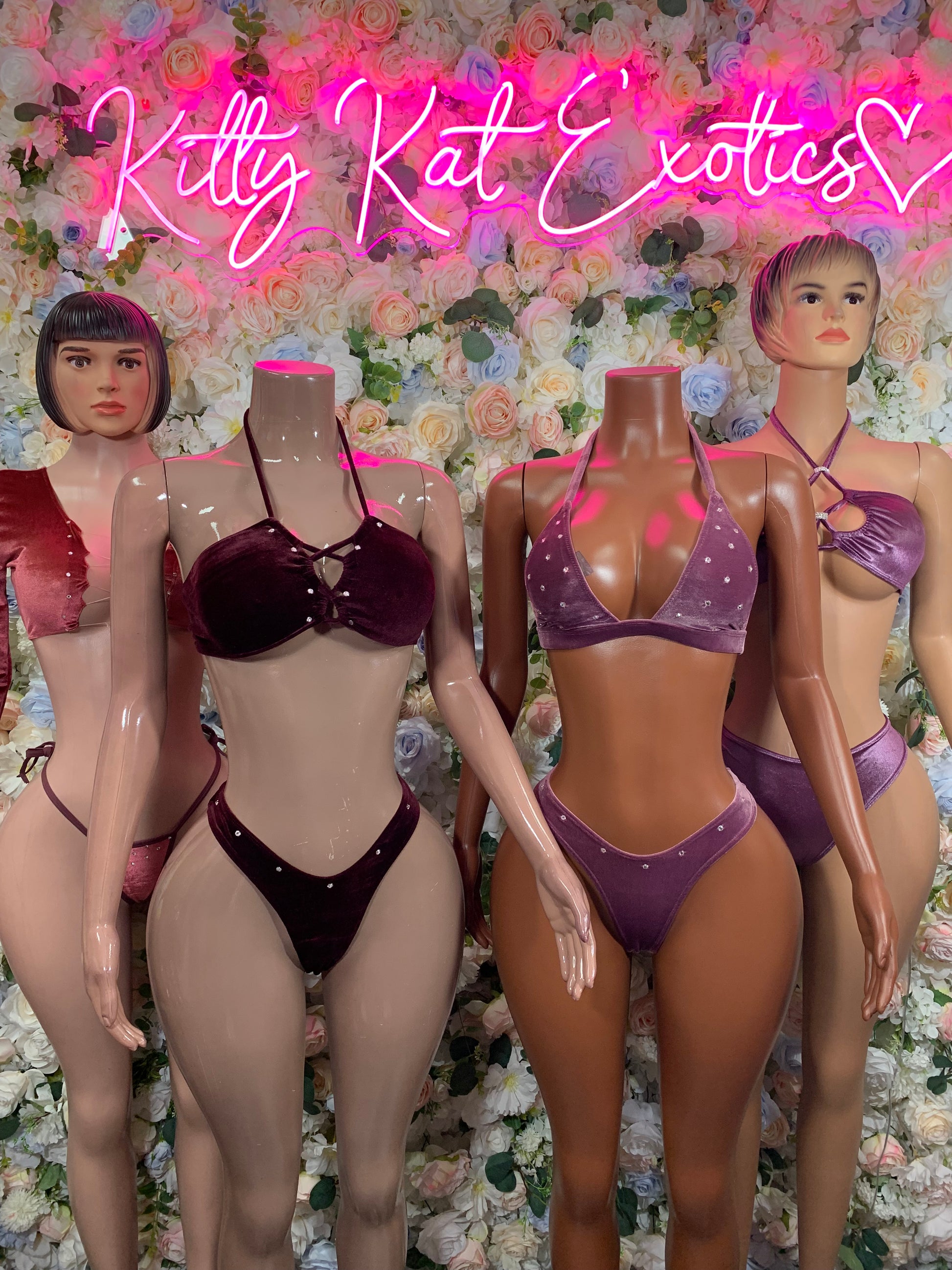 Burgundy velvet bikini dancewear set on three mannequins, halter bra and thong bottoms