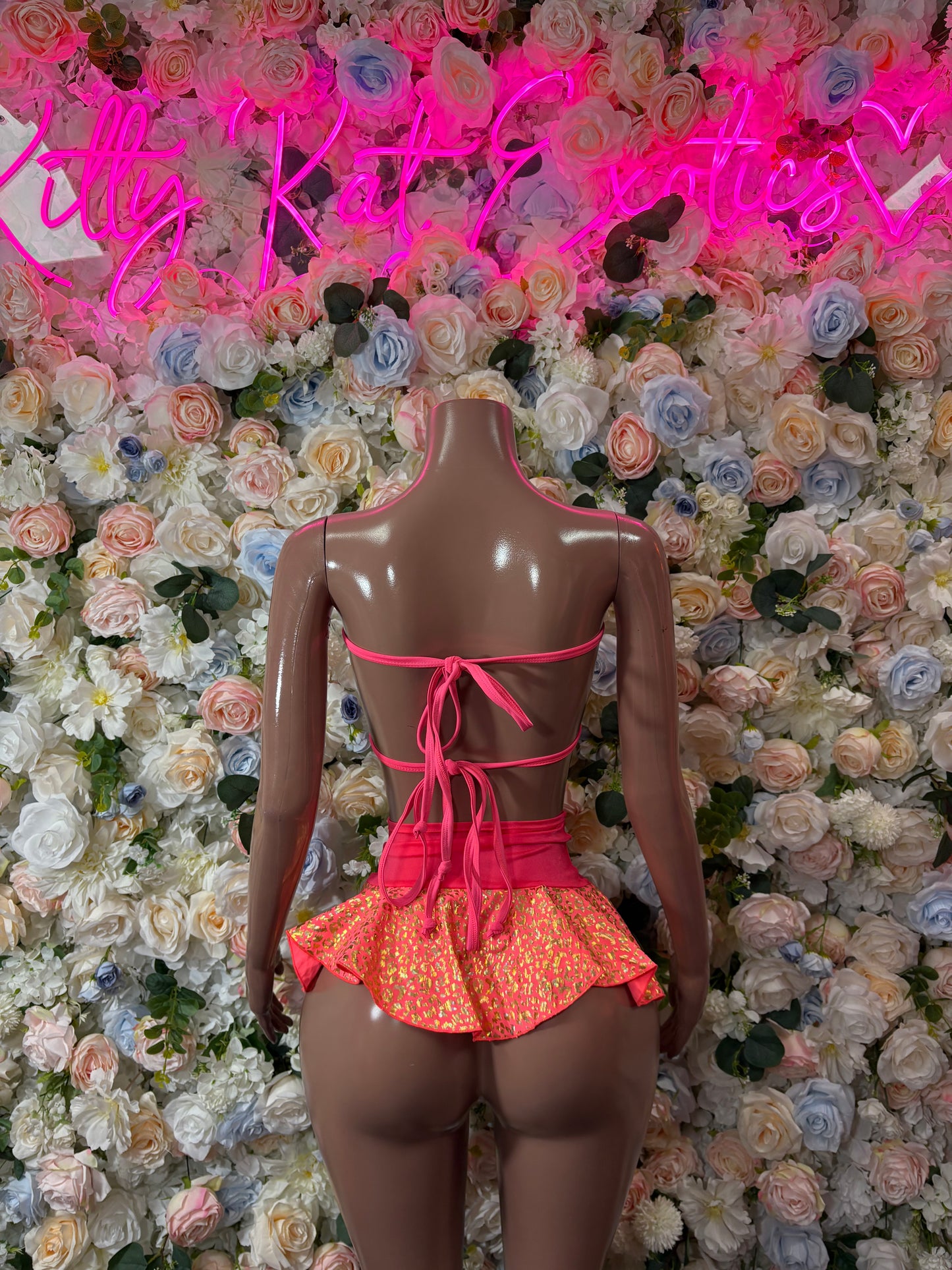 Coral patterned ruffled dance skirt set with crisscross tie back and halter top
