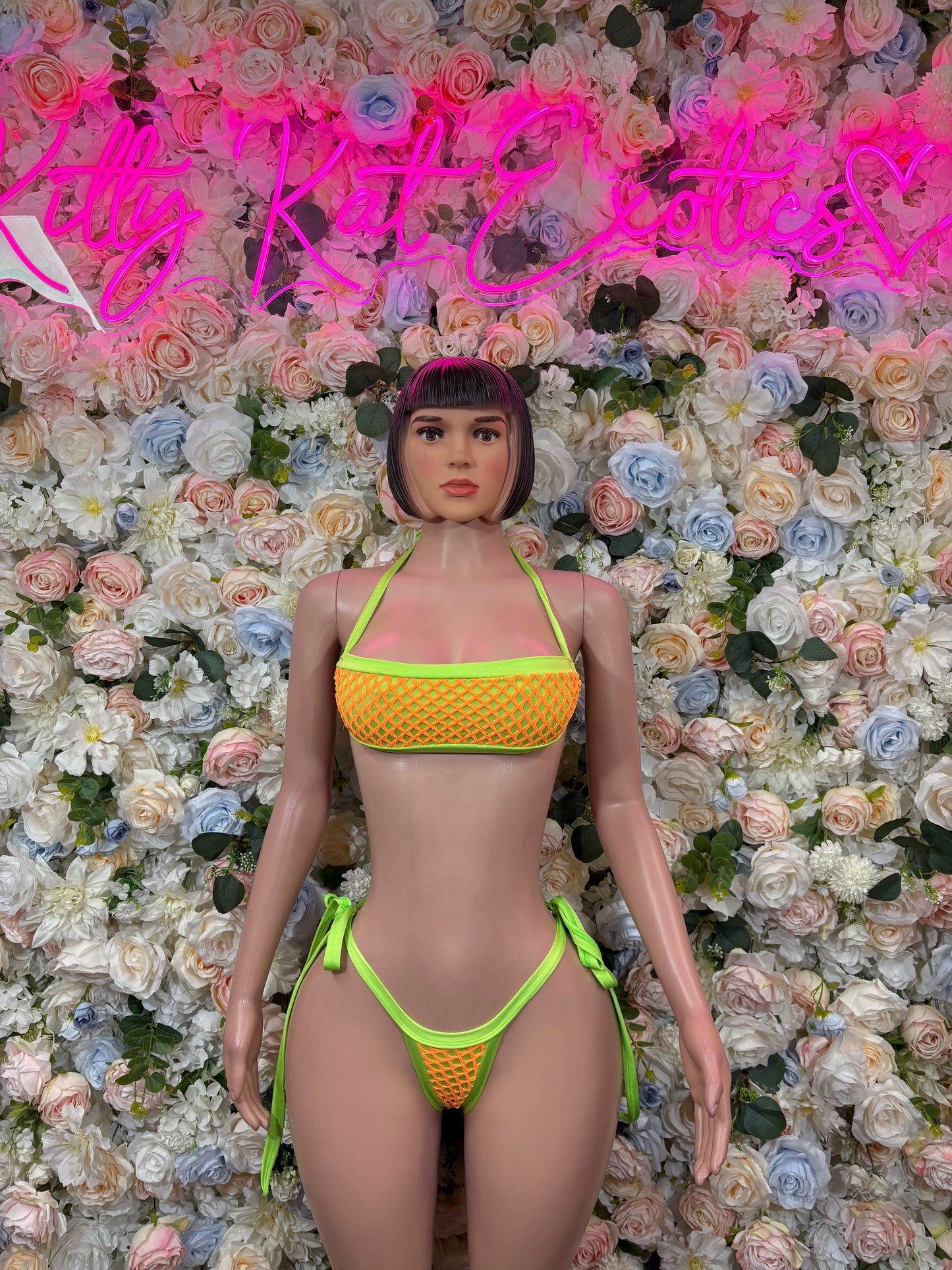 Neon green net-trim bikini set with triangle top and tie-side bottoms