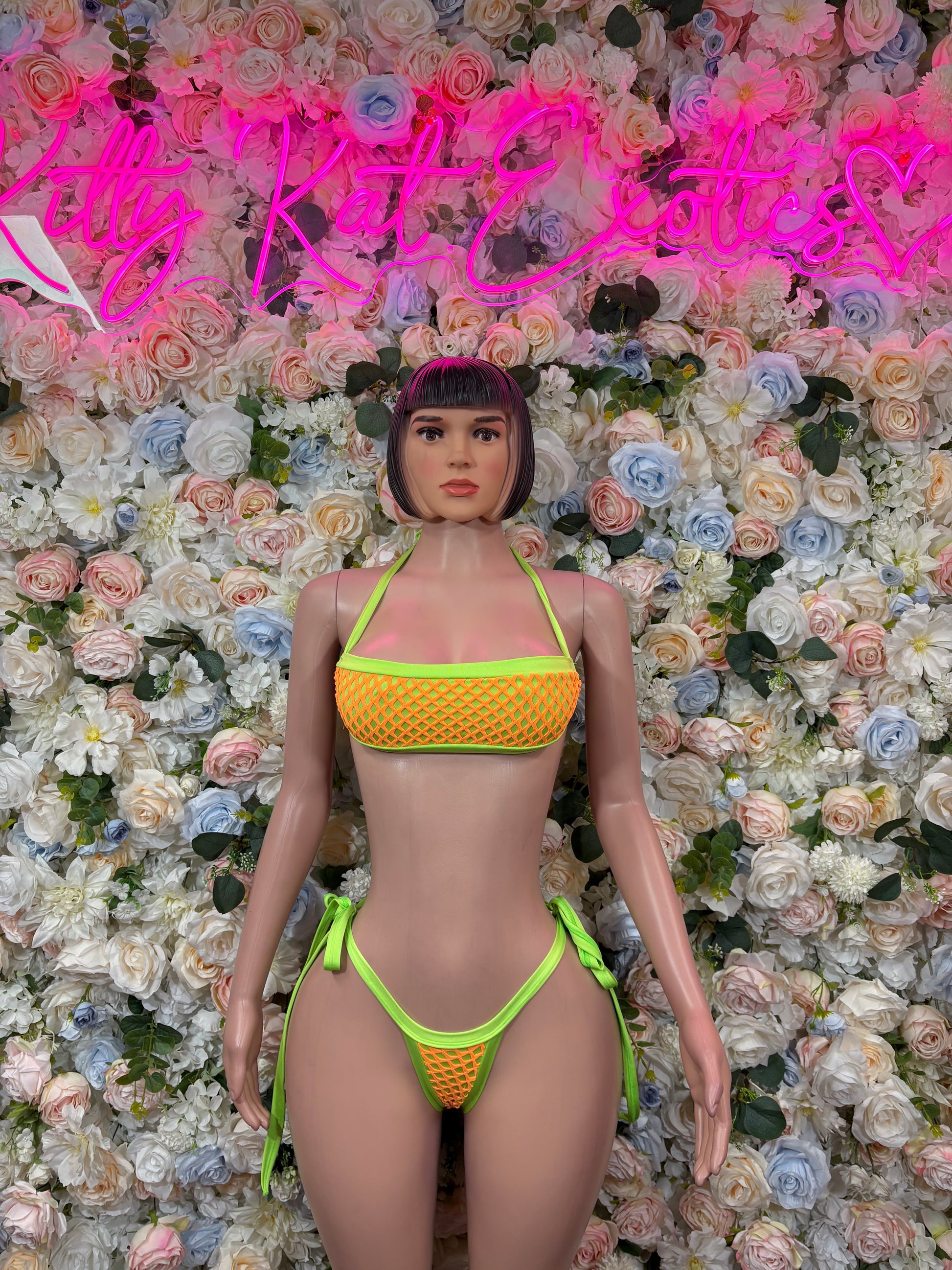 Neon green net-trim bikini set with triangle top and tie-side bottoms