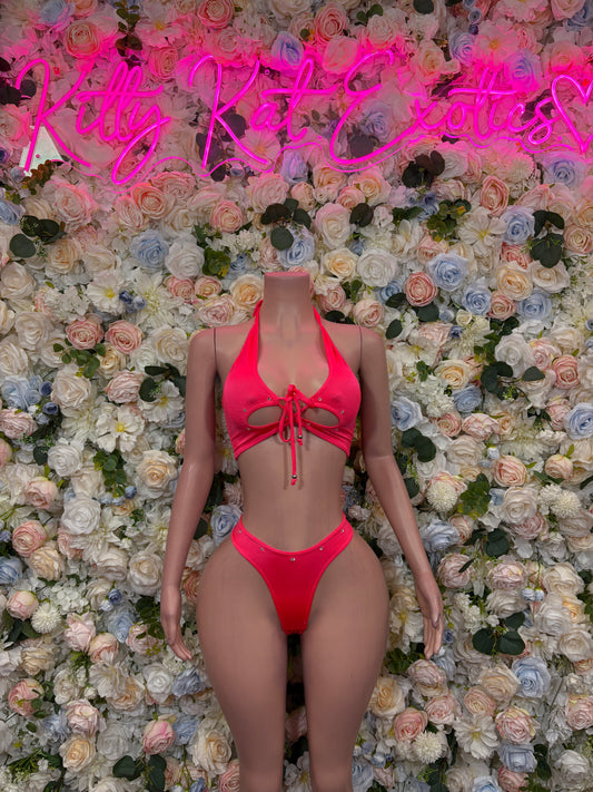 Coral halter two-piece rave outfit with tie-front bikini top and high-cut bottoms