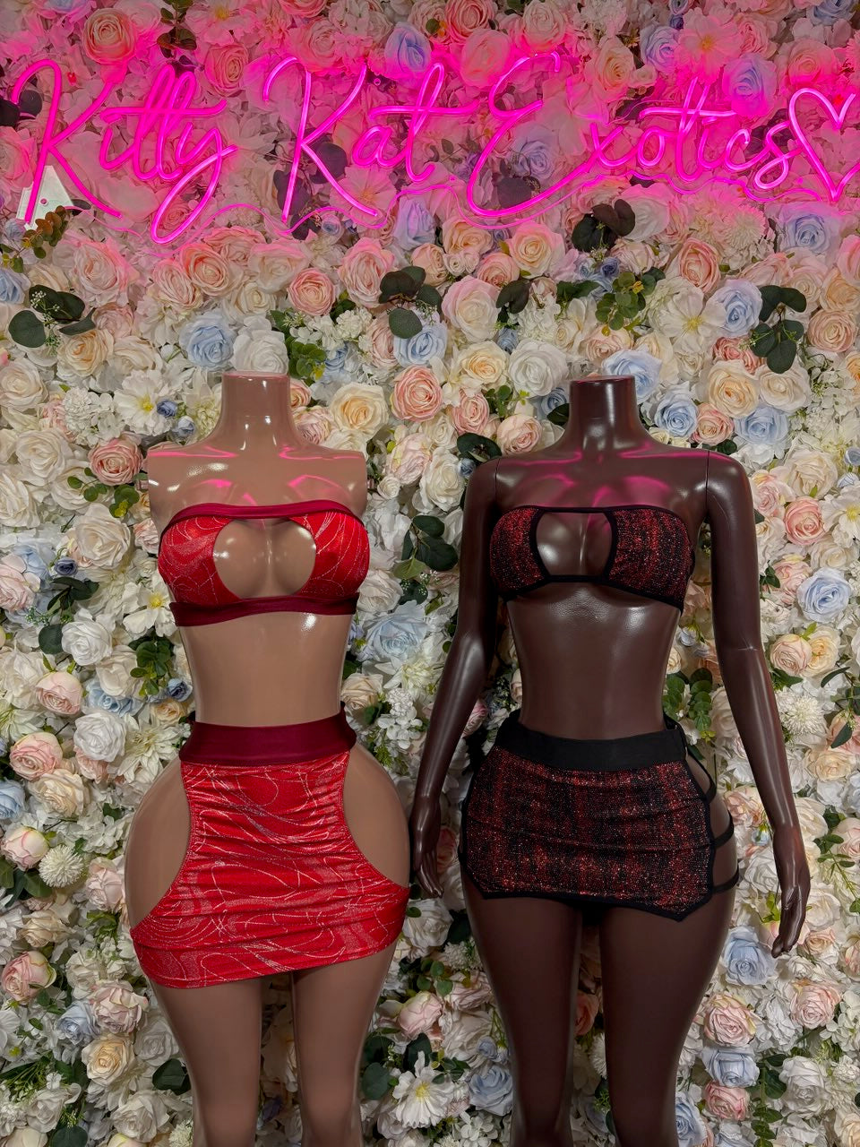 Metallic two-piece rave set: halter crop top and mini skirt on mannequins
