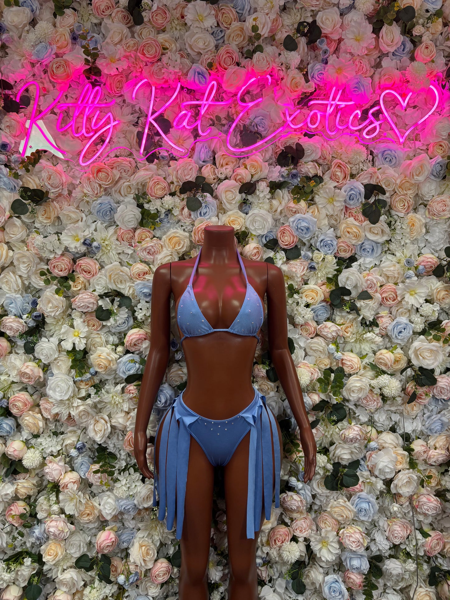 Baby blue two-piece rave outfit with halter triangle top and tassel bottoms