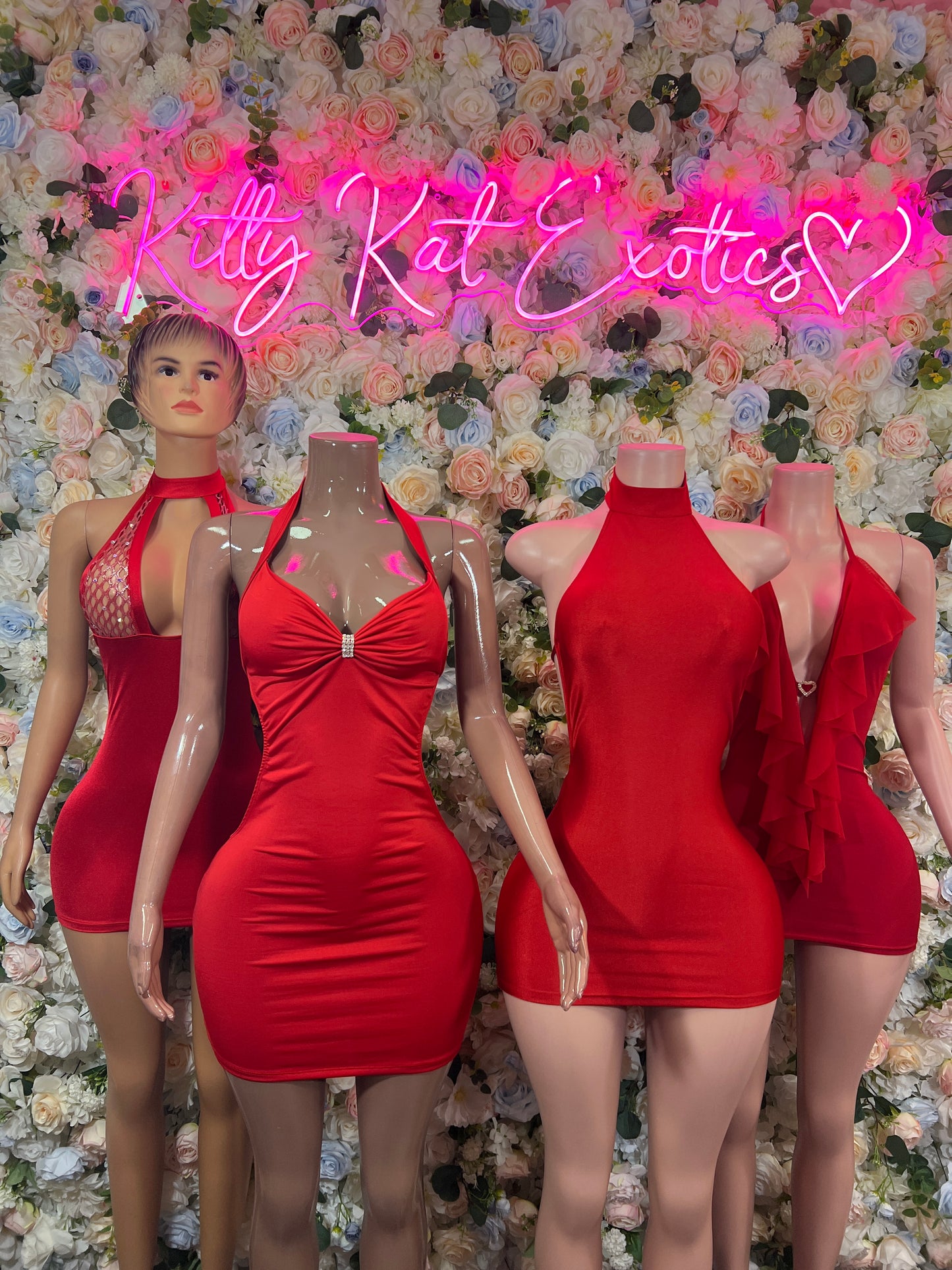 Red halter bodycon mini dress with rhinestone fishnet chest panel