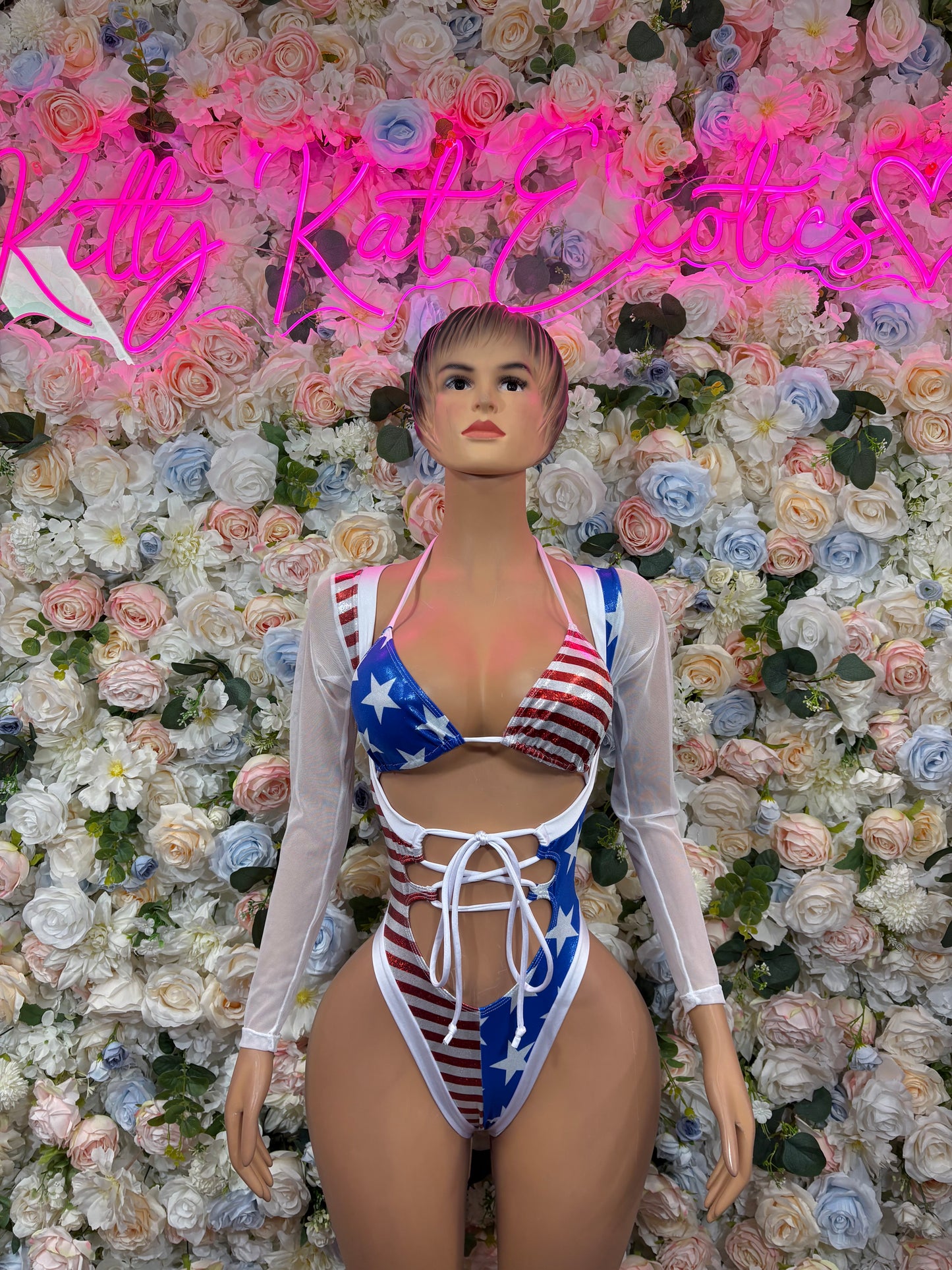 American flag bodysuit with blue star panel, red stripes, lace-up front, long sheer sleeves