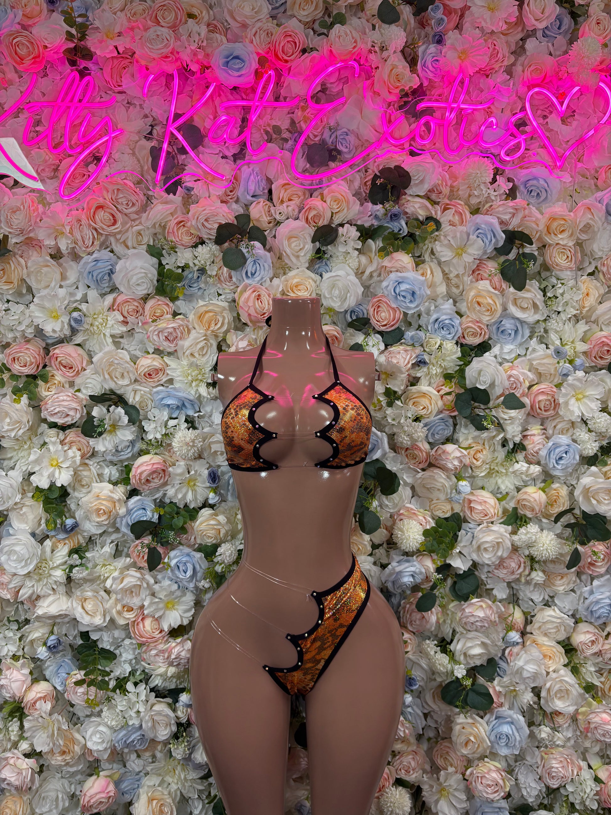 Orange snake-print lingerie set: triangle bra with high-cut bottoms