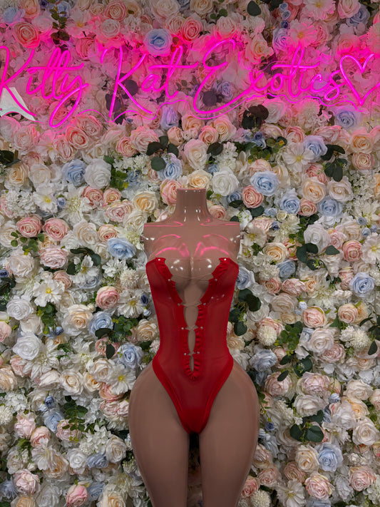 Red glossy bodysuit with deep V front and sheer side panels