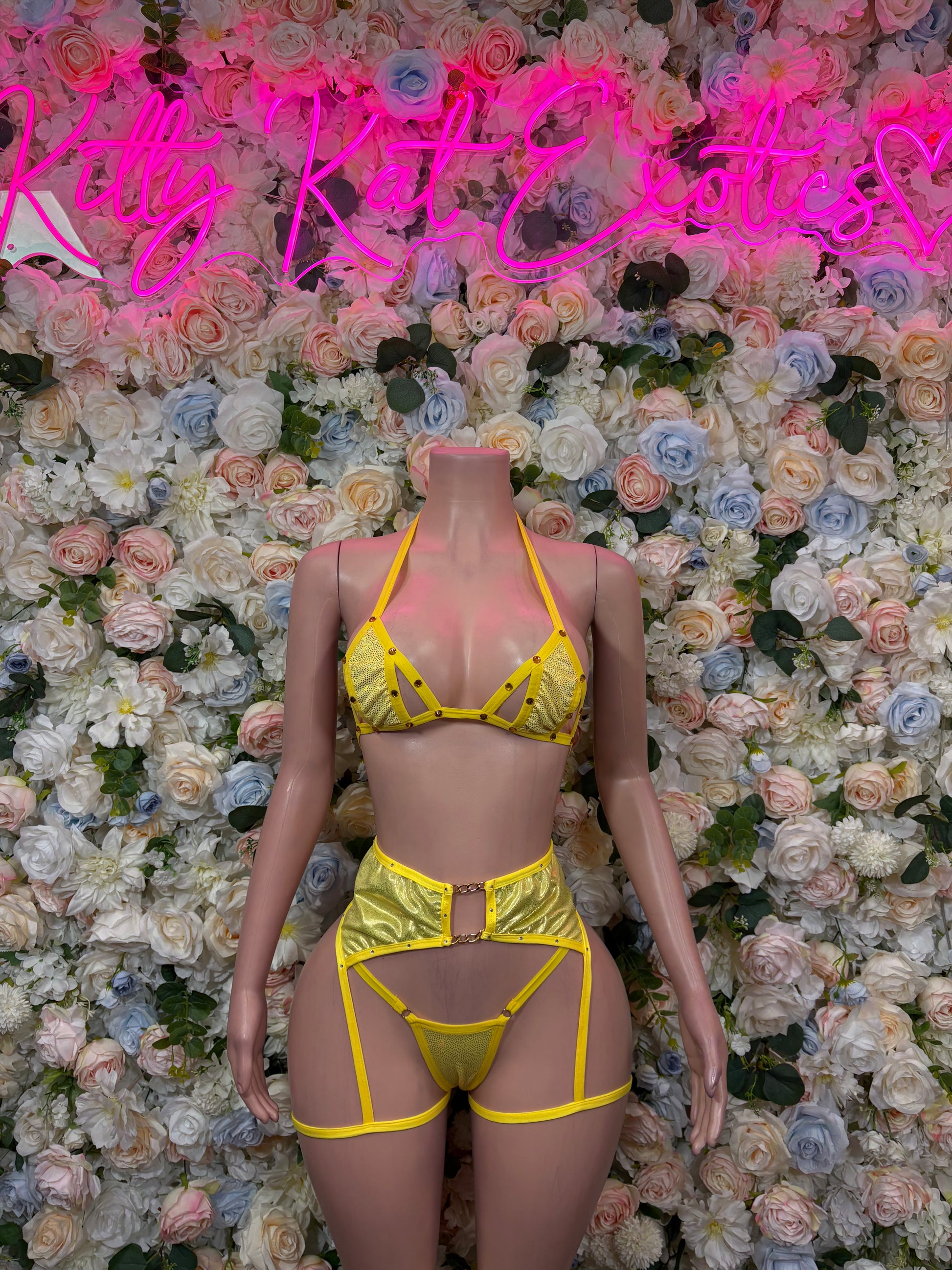 Yellow lingerie set with triangle bra and strappy thong-style bottom