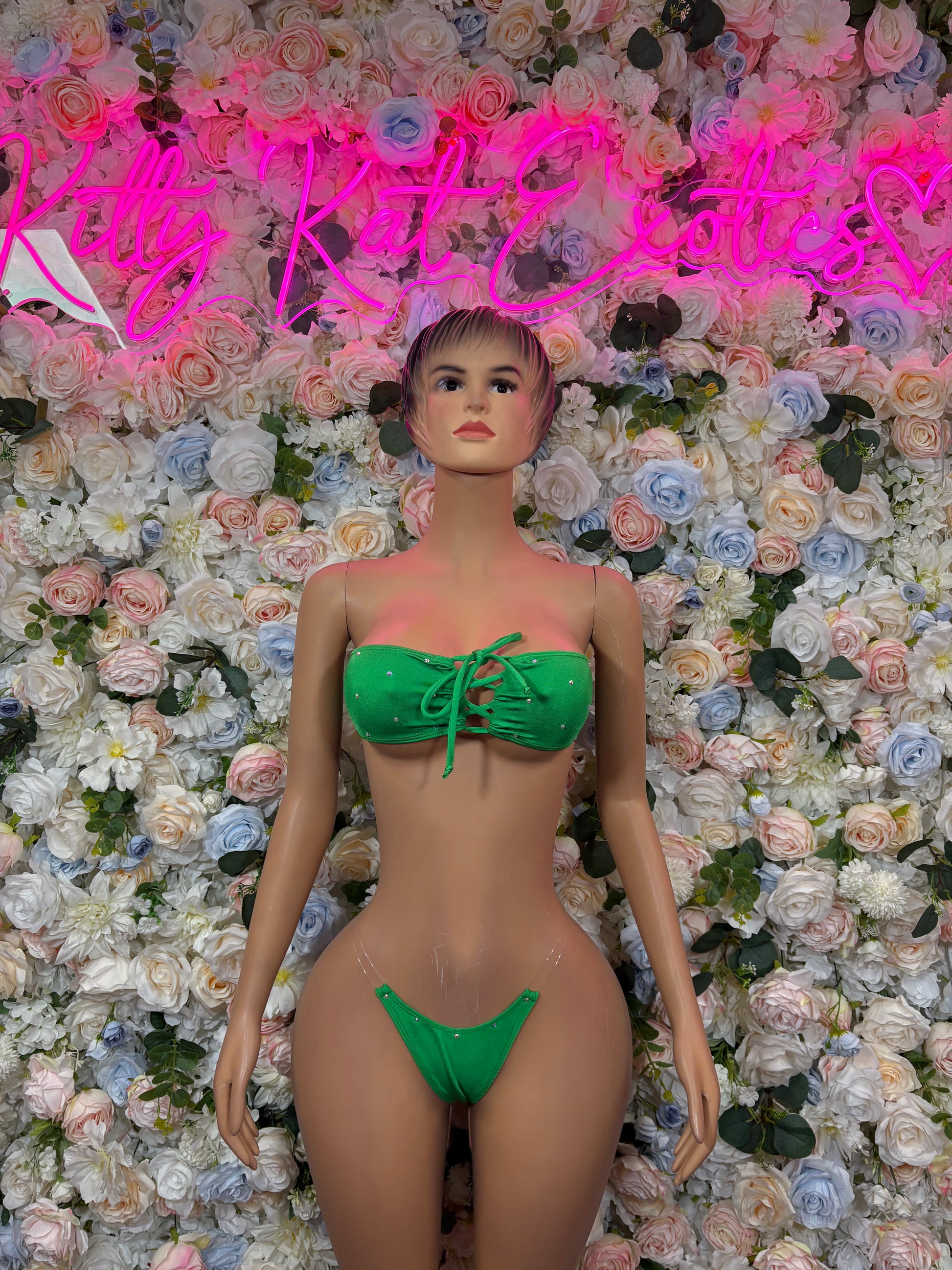 Green bandeau bikini set with center tie bow and matching thong bottoms