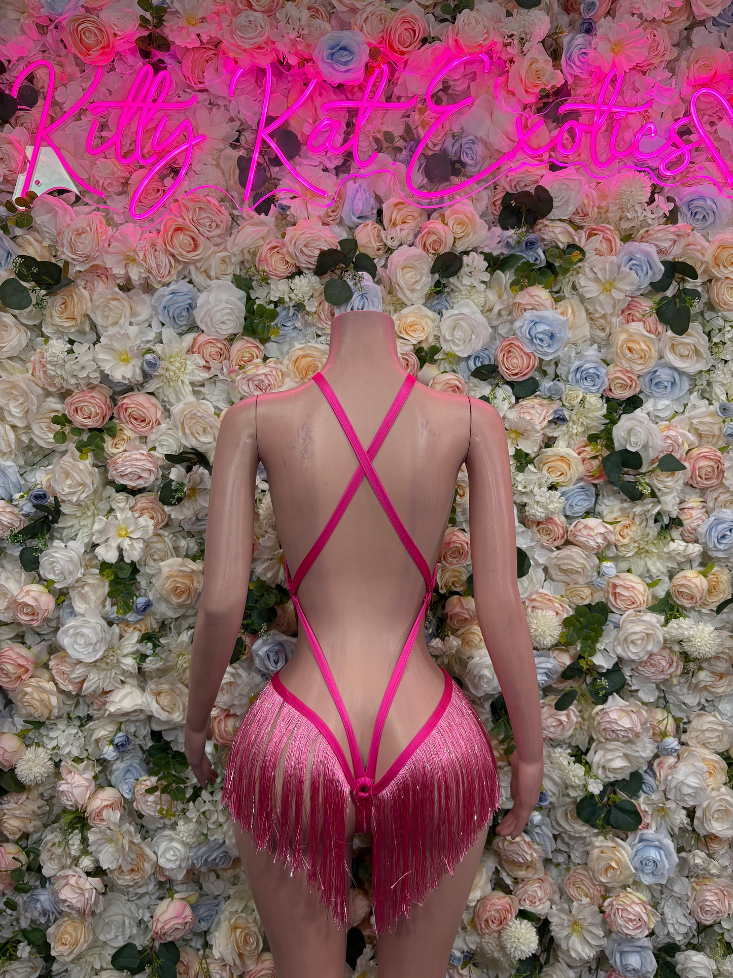 Pink fringe one-piece bodysuit with crisscross open back and V straps