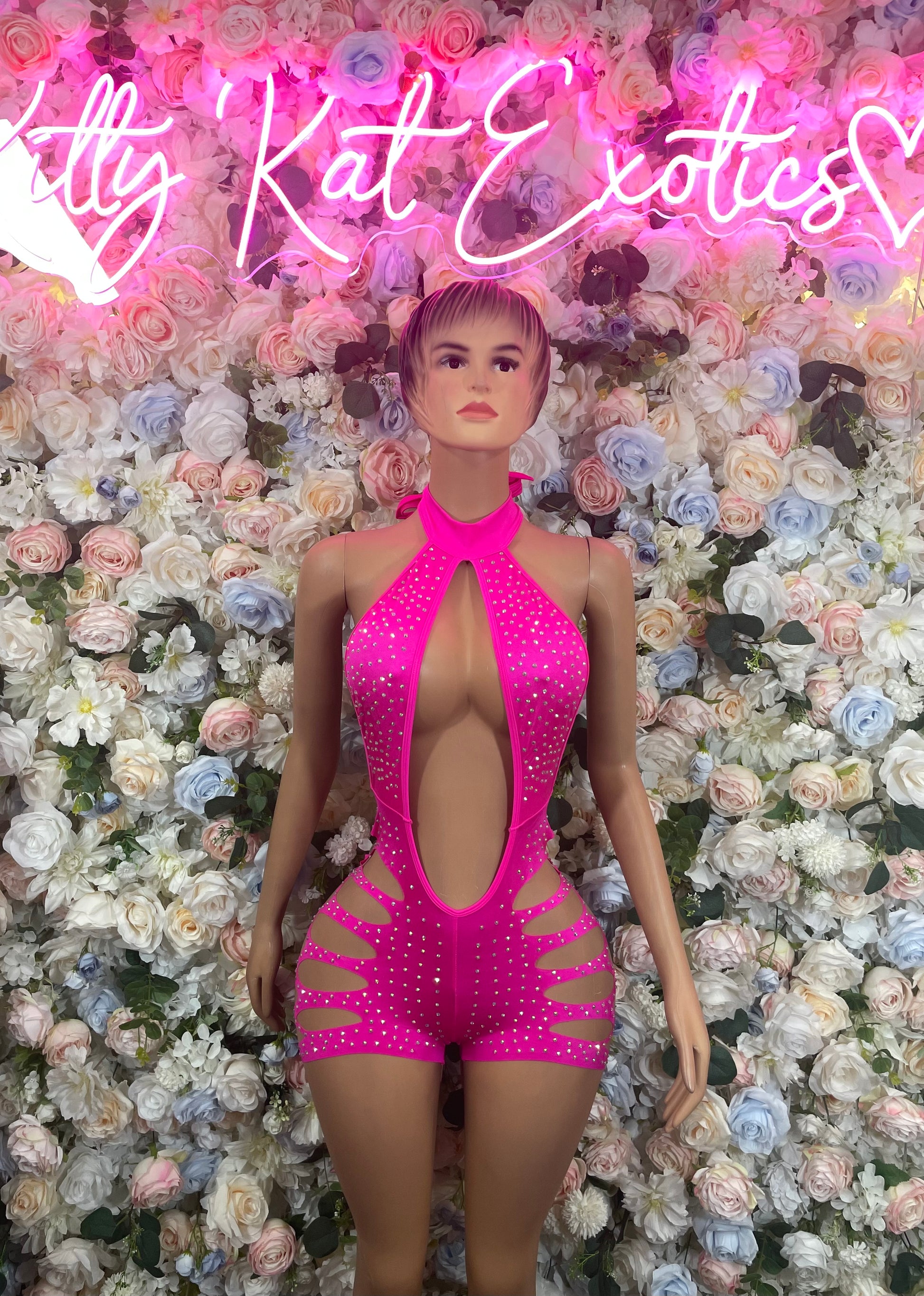 Pink rhinestone halter bodysuit with open V-front and cutout sides