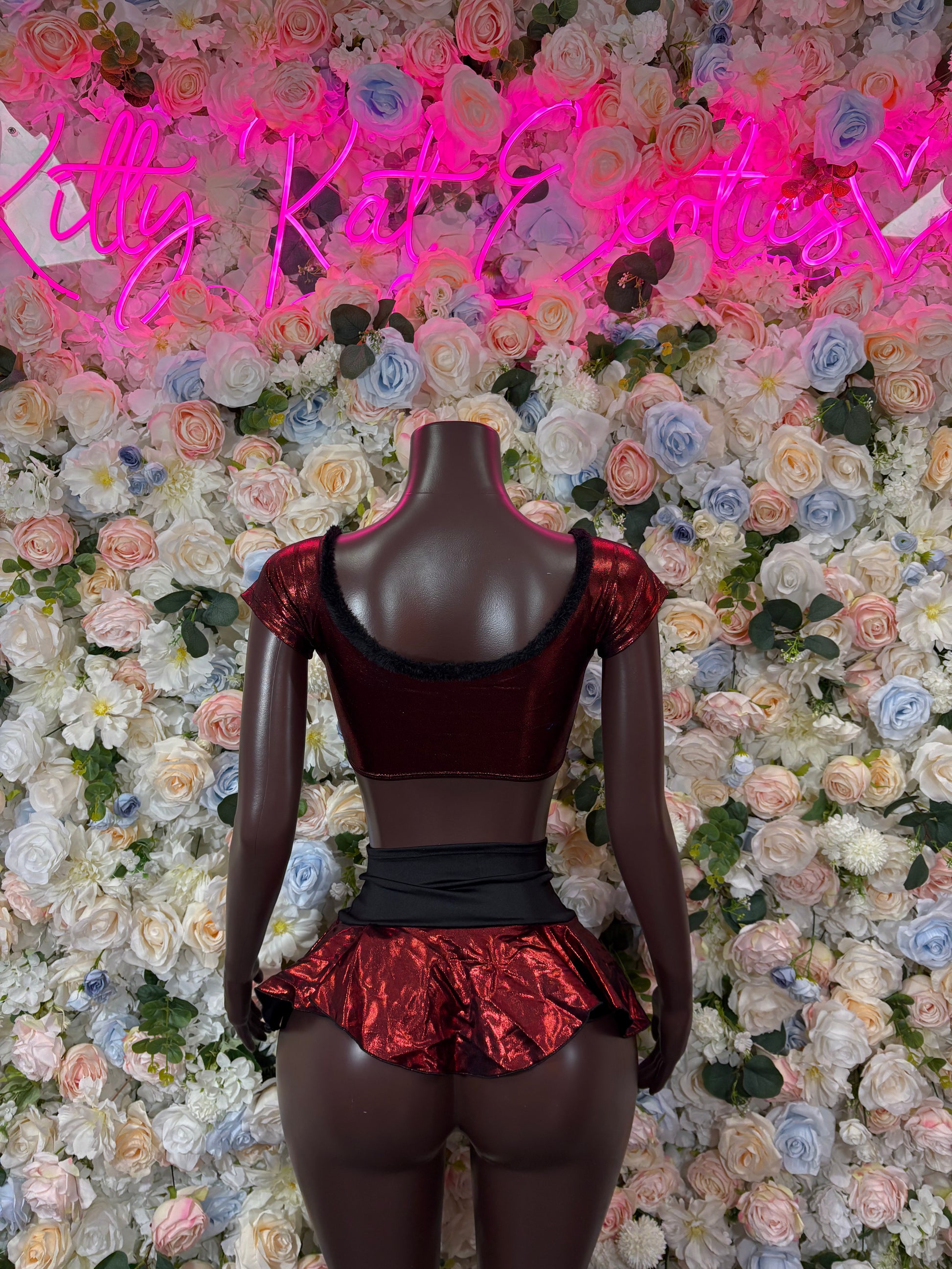 Women’s burgundy satin crop top with sheer neckline and ruffle mini skirt set