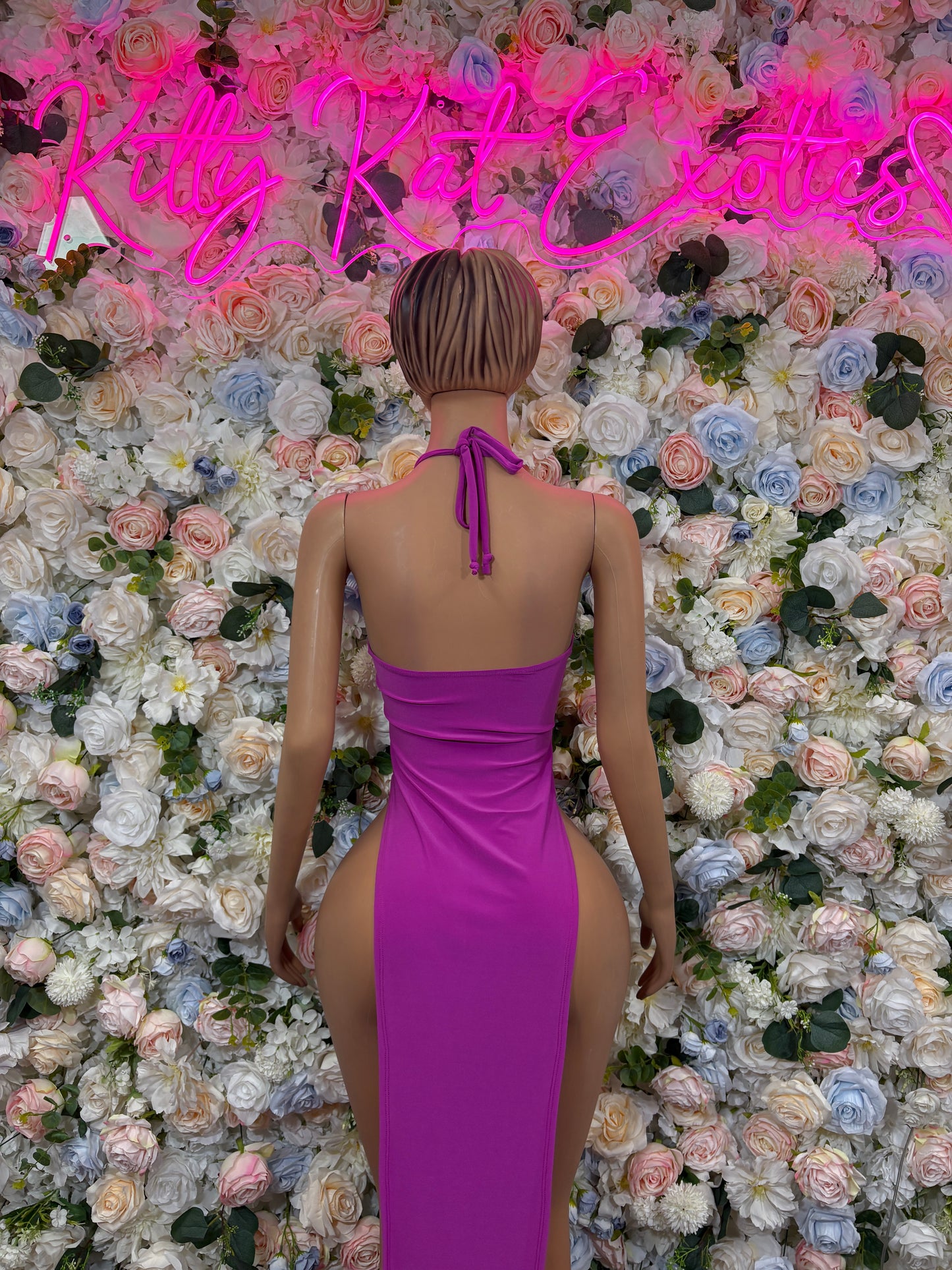 Purple halter rave bodysuit with open back and tie neck