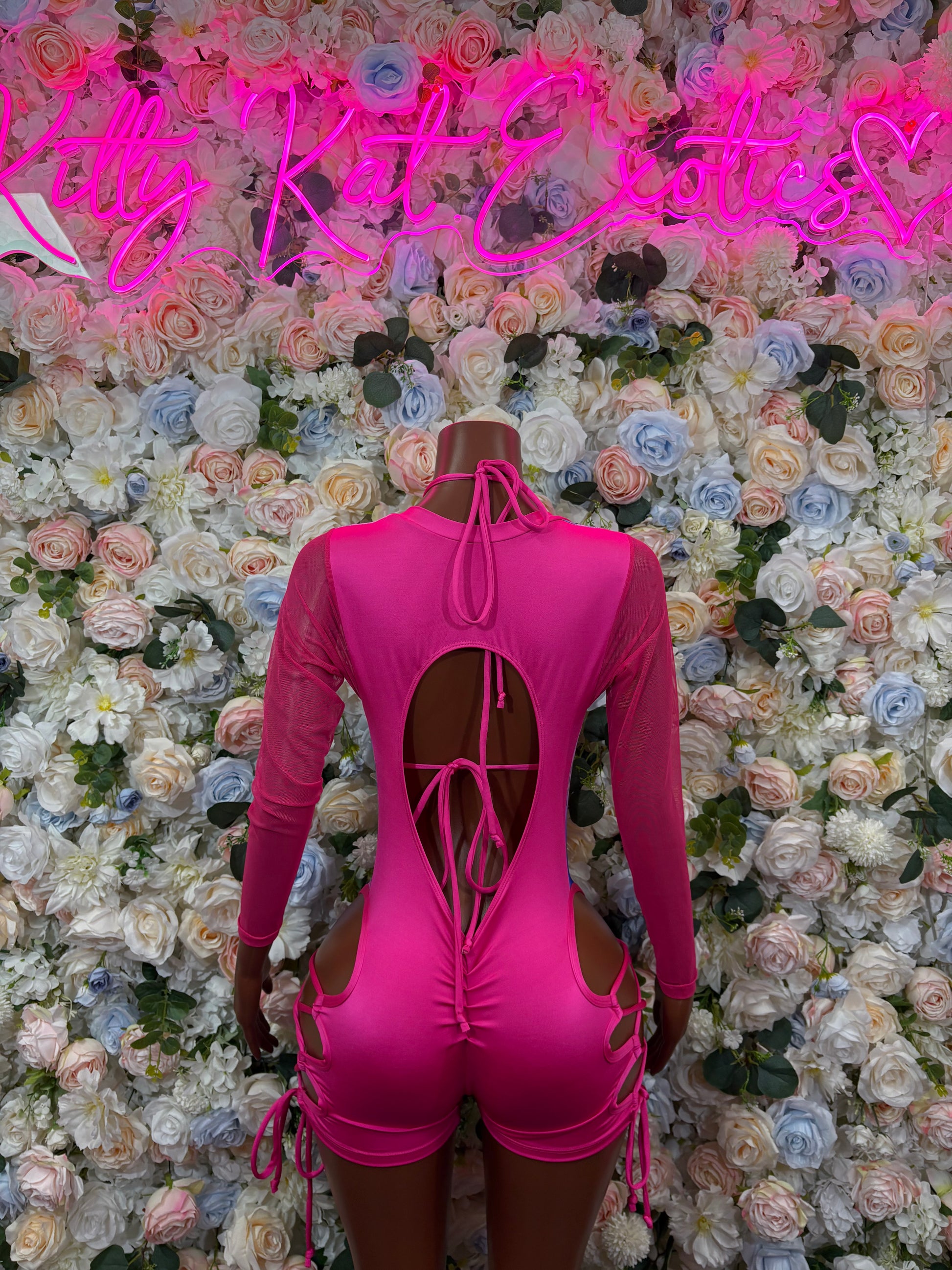 Metallic pink bodysuit, open back with crisscross lace-up detail and long sleeves
