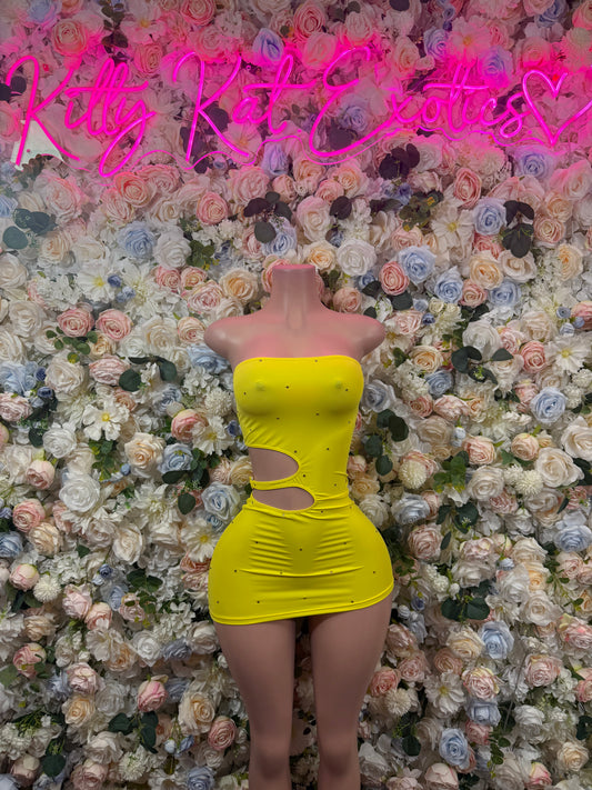 Yellow mini dress with scoop neckline, ruched panel, and waist cutout