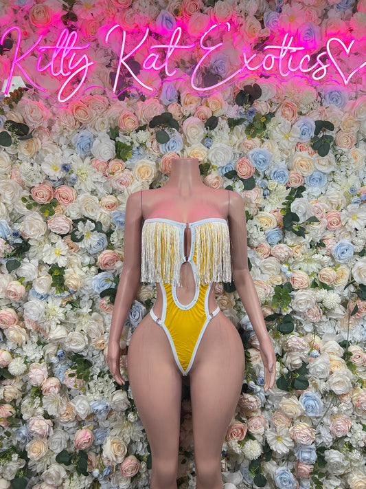 Shiny yellow latex strapless bodysuit with long fringe at bust, high-cut bottoms