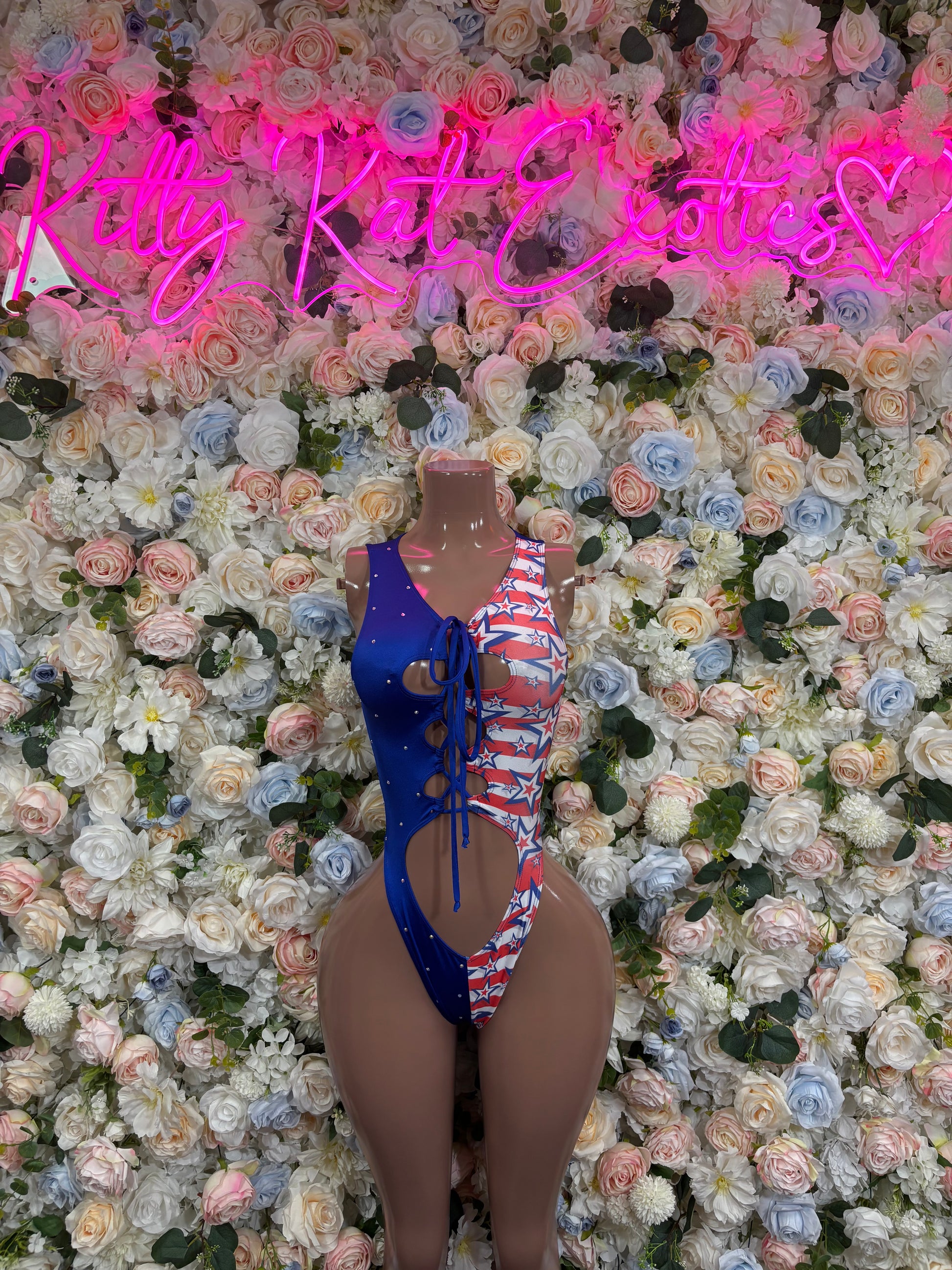 Patriotic flag bodysuit with lace-up front, blue red-and-white stars print