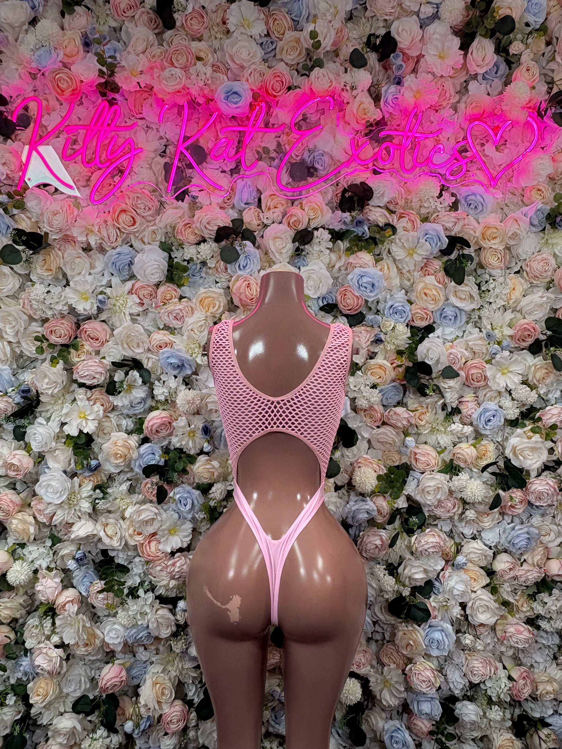 Pink mesh dot bodysuit with scoop neckline and high-cut thong back