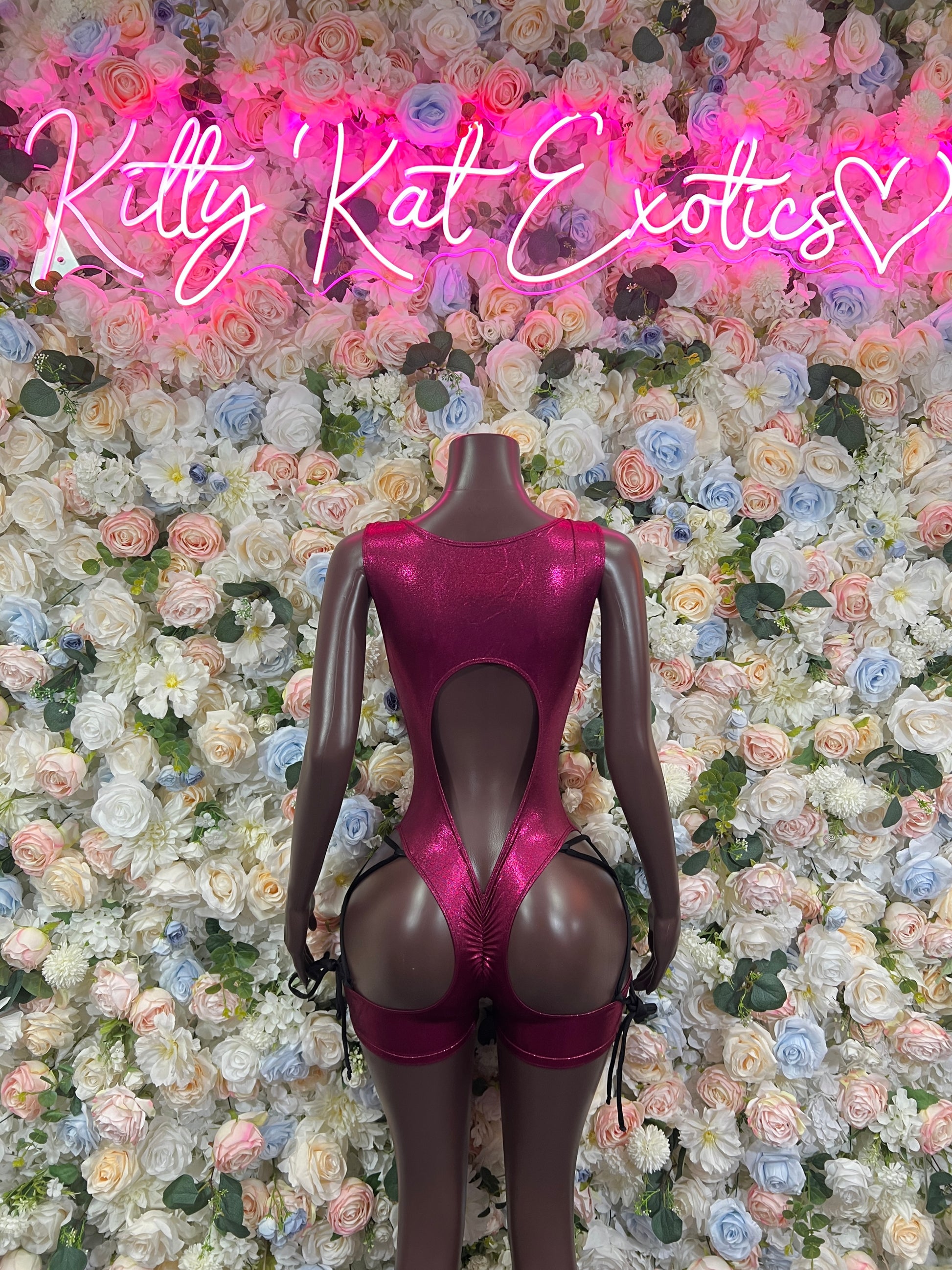Burgundy lace-up dance bodysuit with sheer sleeves and open back cutout