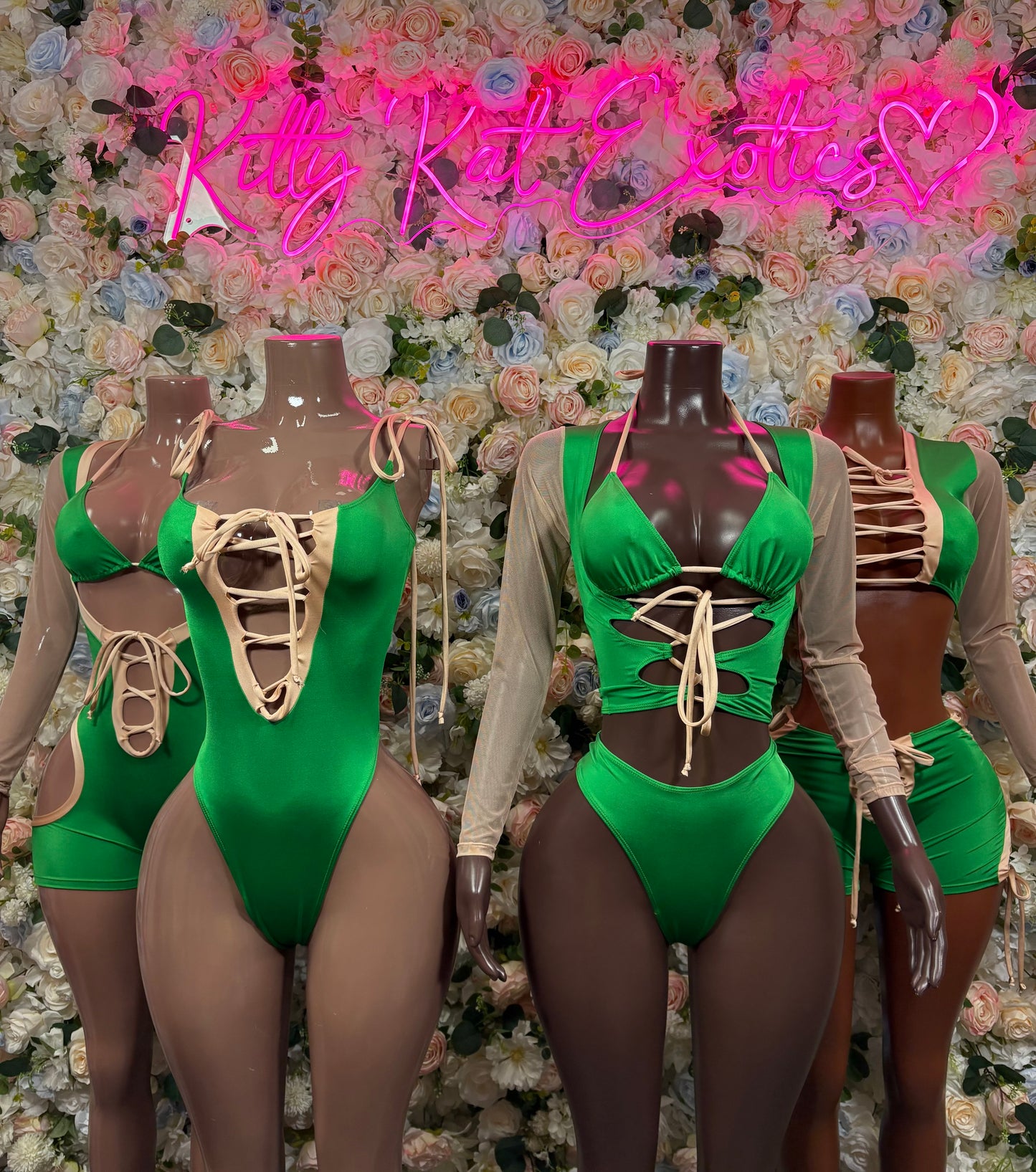 Green lace-up festival bodysuit with sheer sleeves and V-cut front