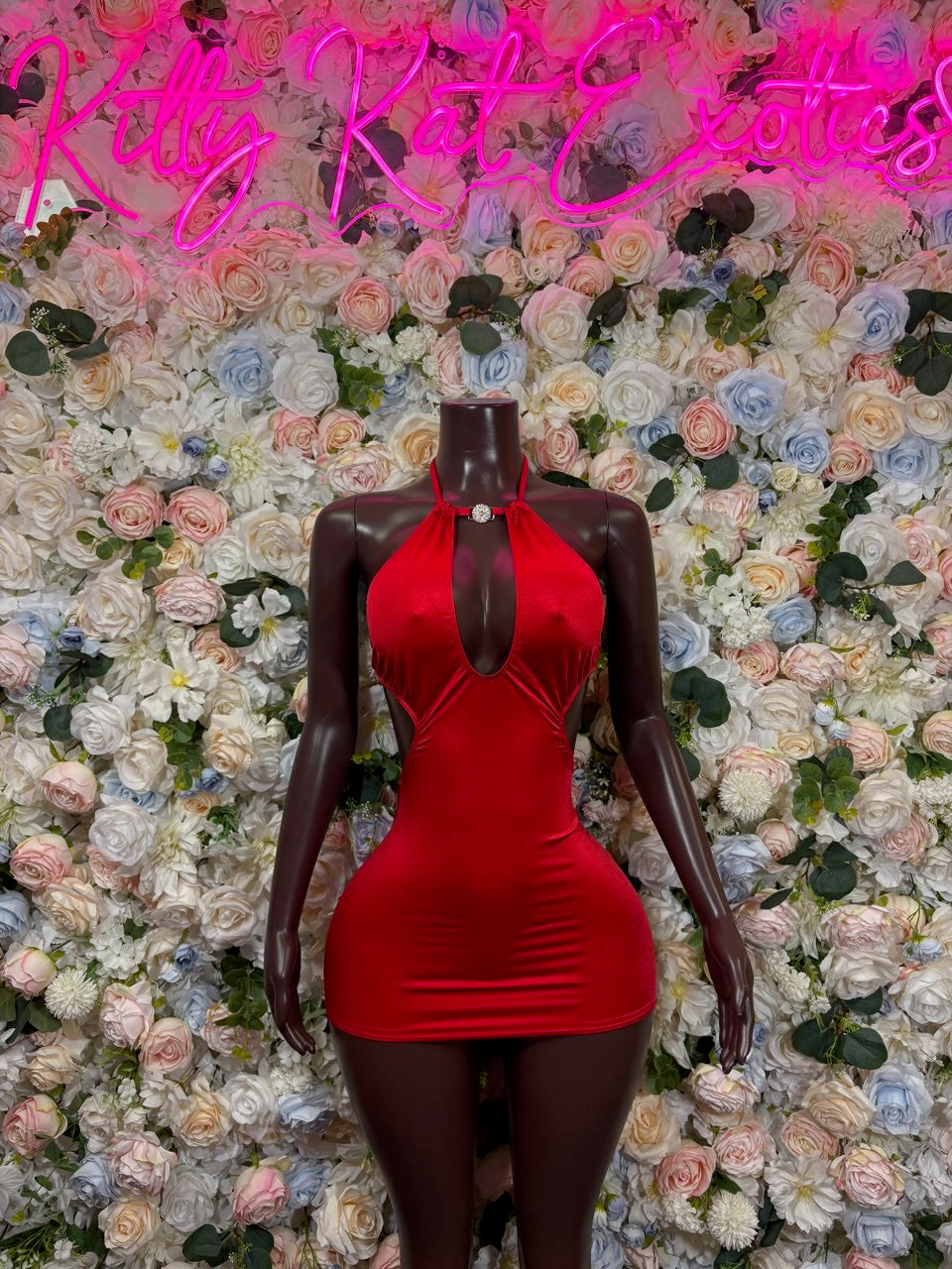 Red mini bodycon dress with halter neckline and ruched front detail
