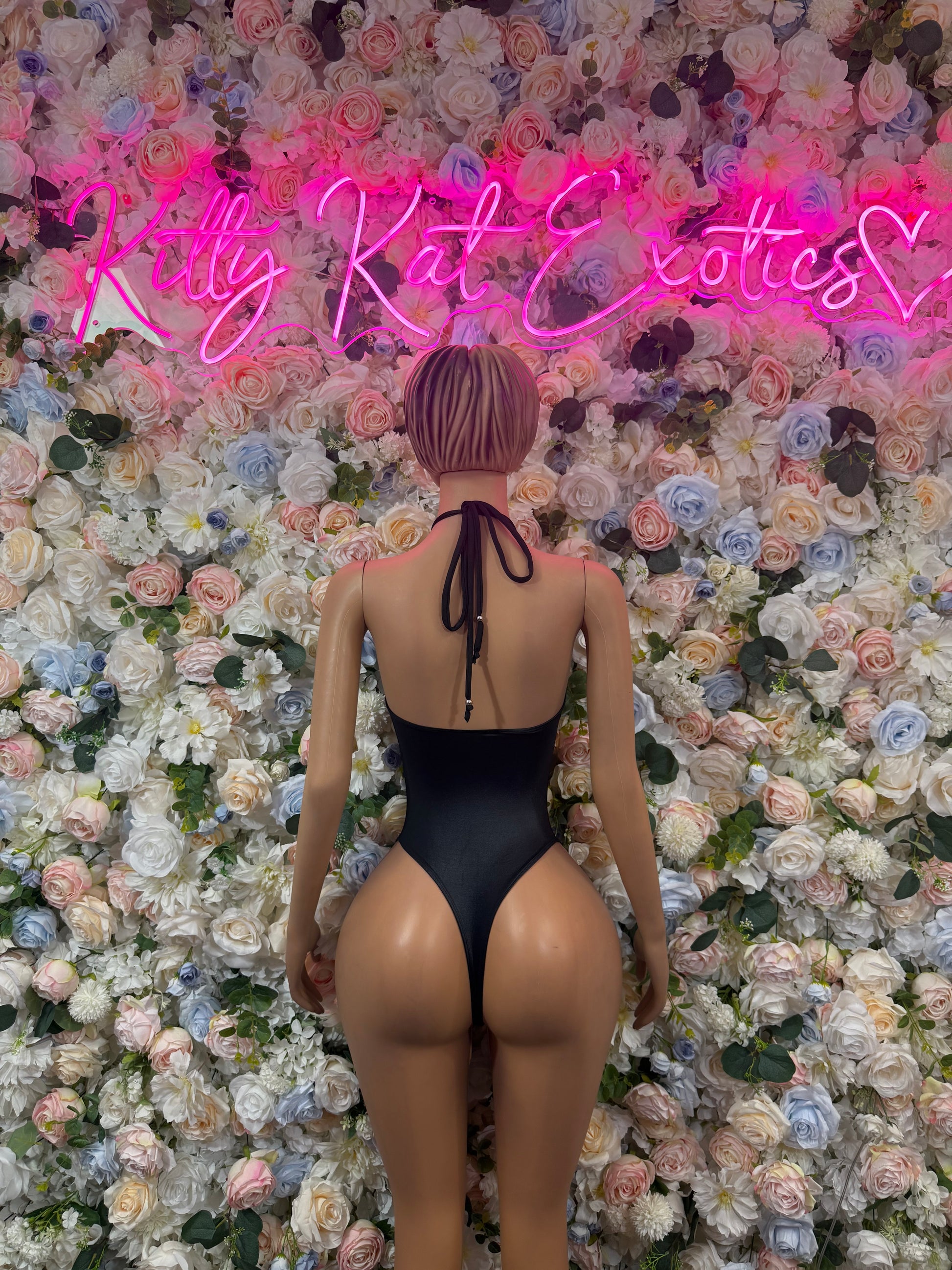 Black cutout halter one-piece bodysuit, open back with tie straps