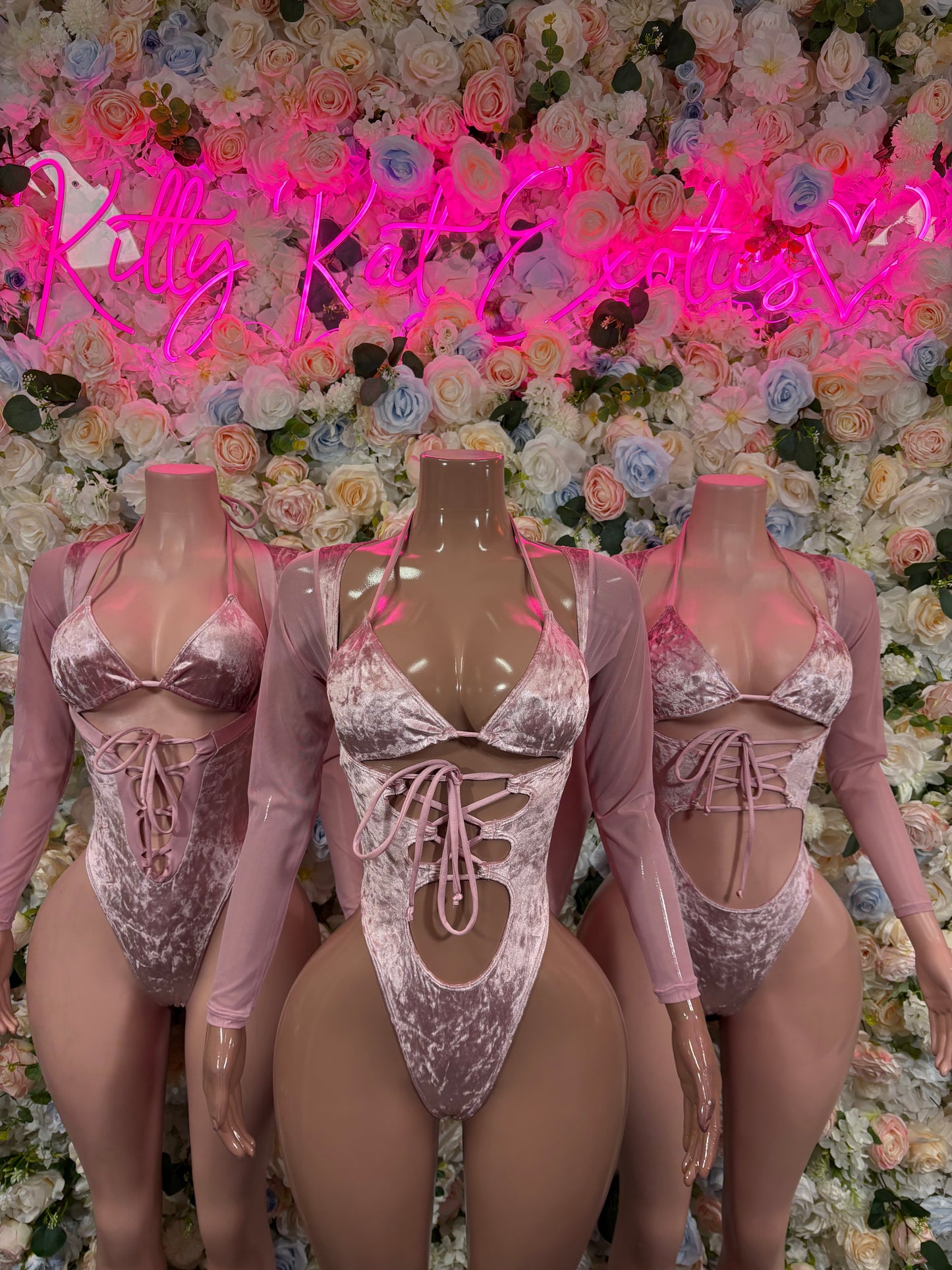Rose pink velvet bodysuit with lace-trim bra top, thong bottom, open cutouts