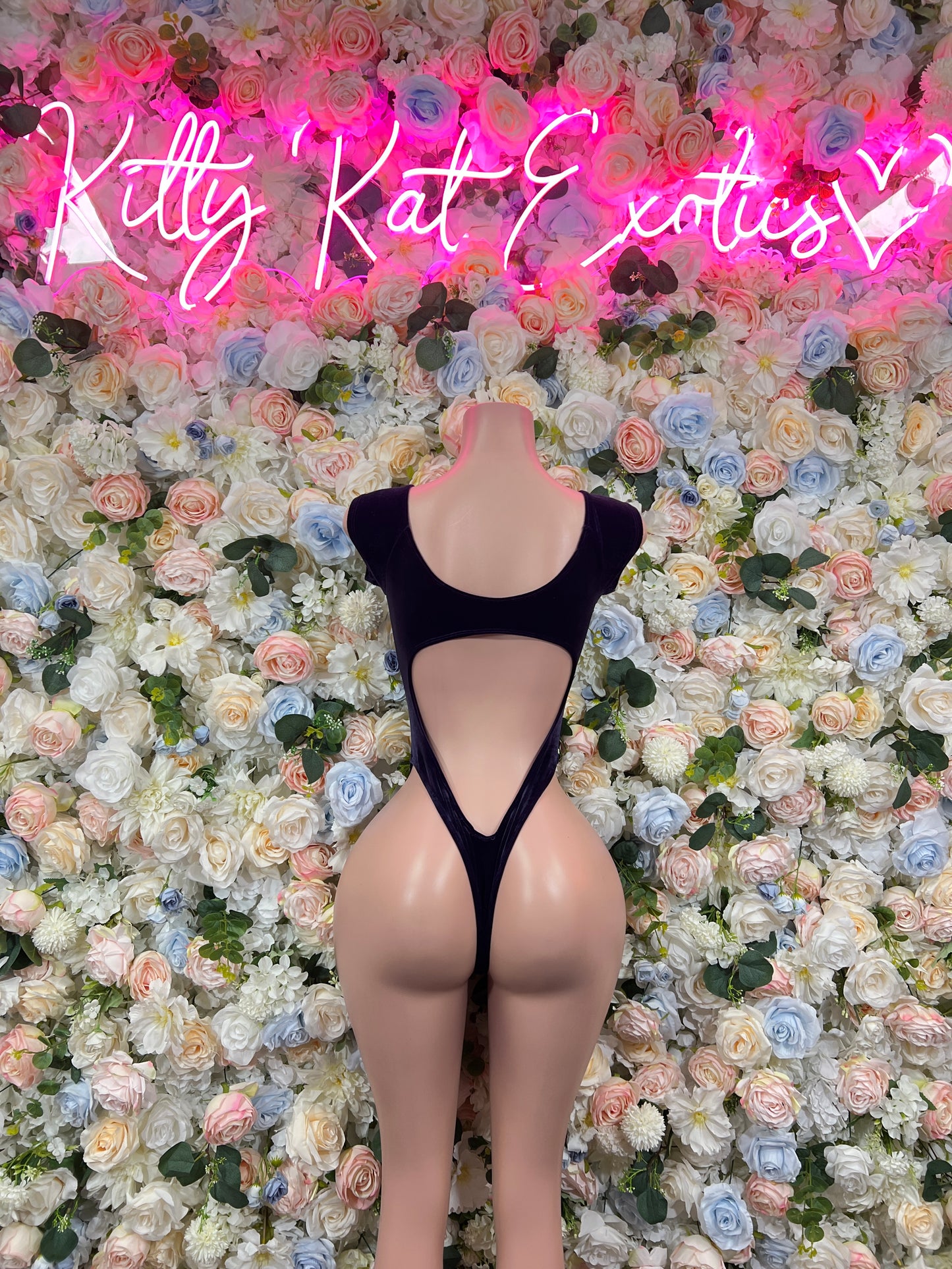 Blue velvet backless one-piece bodysuit with strappy cutout back and long sleeves