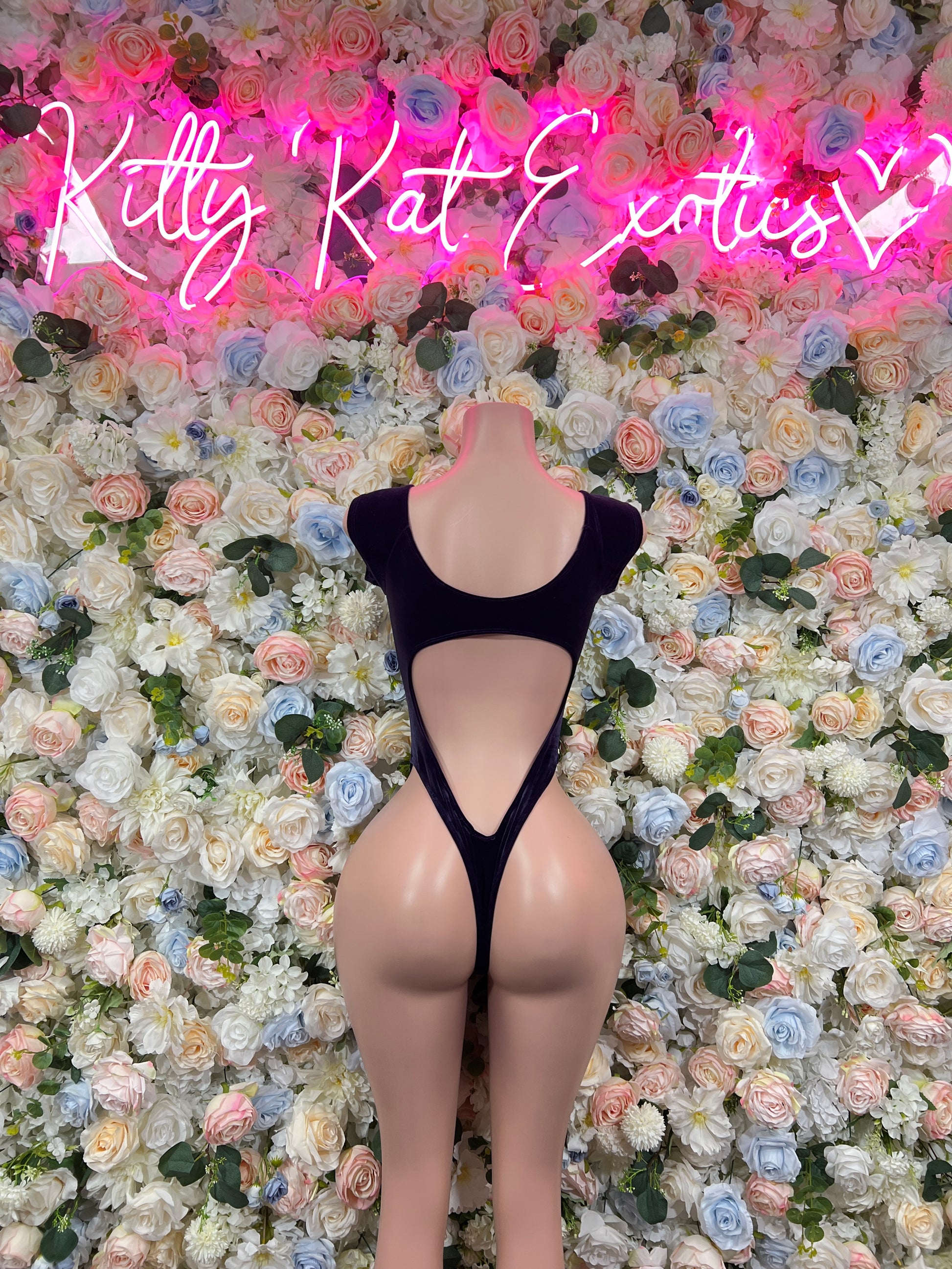Blue velvet backless one-piece bodysuit with strappy cutout back and long sleeves