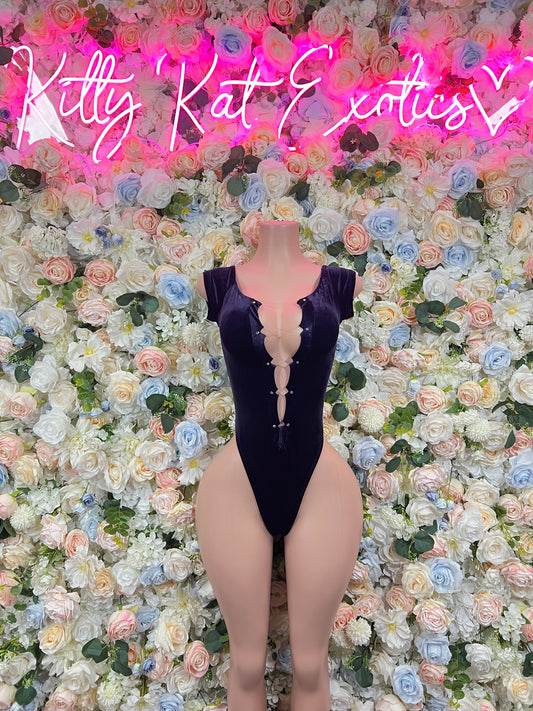 Blue velvet one-piece bodysuit with deep plunging neckline and long sleeves