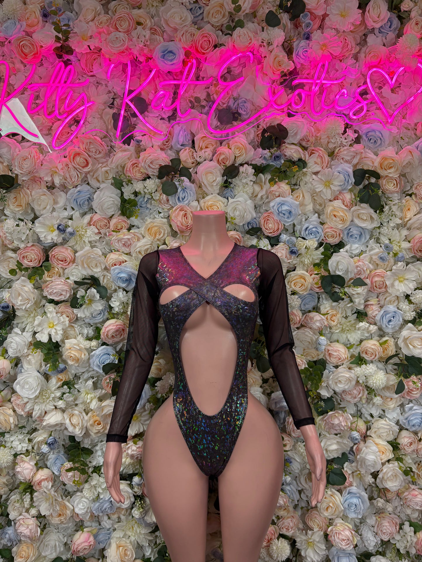 Black metallic bodysuit with long sleeves and cutout front