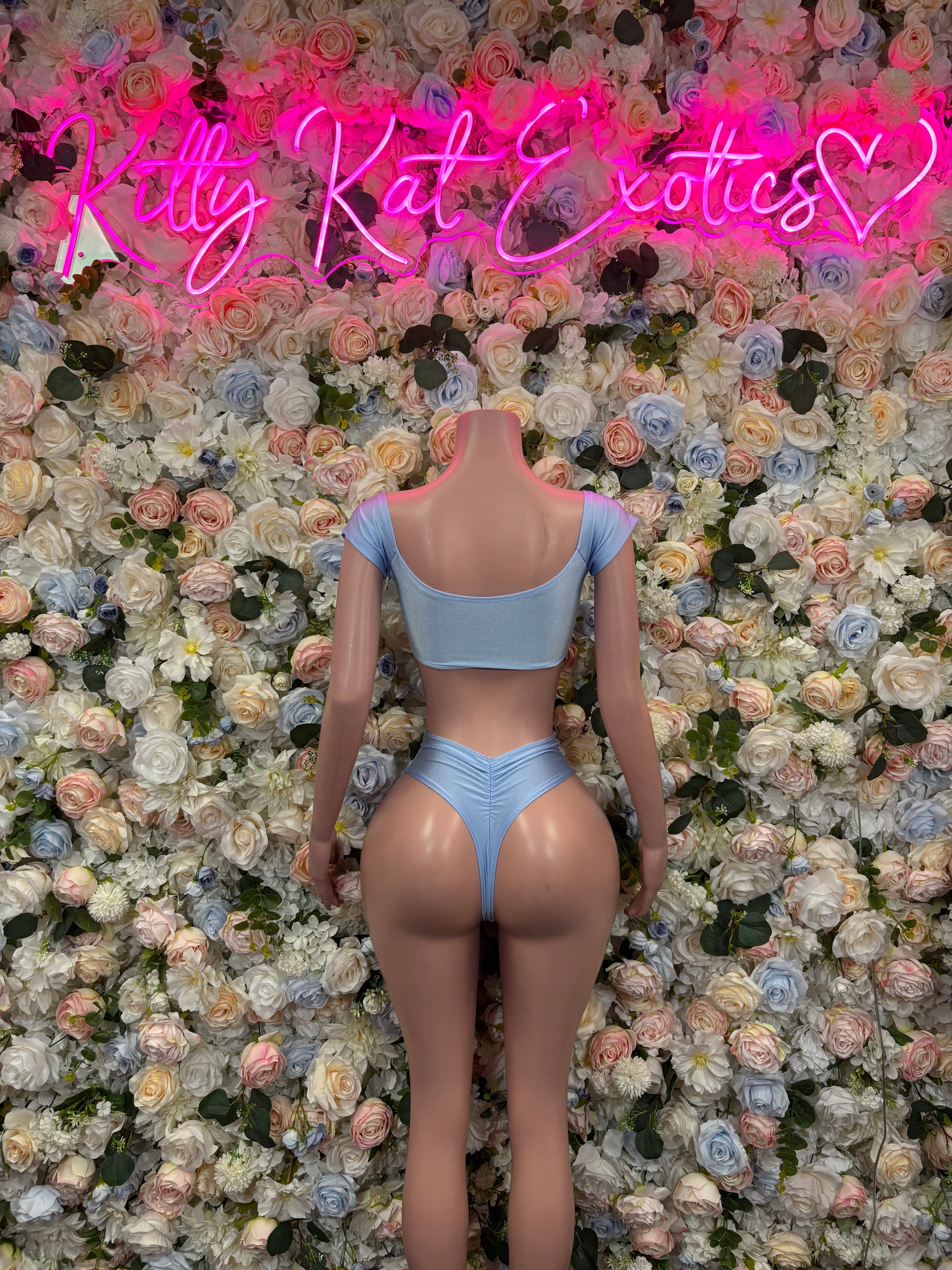Baby blue two-piece rave outfit with halter backless top and high-waist bottoms