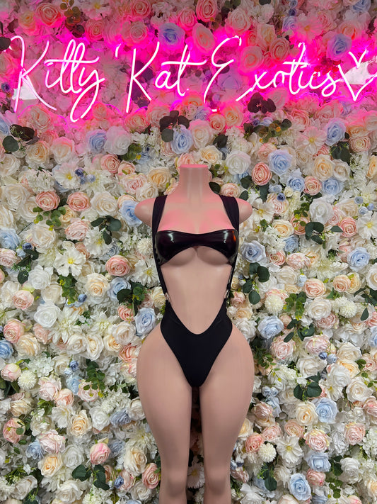 Black one-piece bodysuit with cheeky cutout front and strap detailing