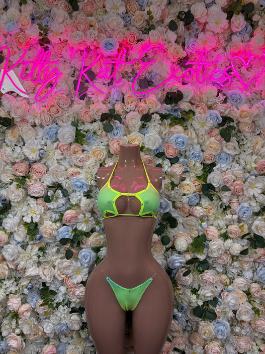 Green triangle bikini top with lace ties and high-cut bottoms, two-piece set