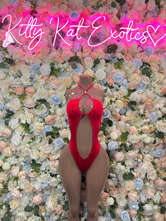 Red halter bodysuit with open back and oval cutout, thong-style bottom