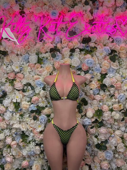 Neon green two-piece bikini set with black mesh triangle bra and matching briefs