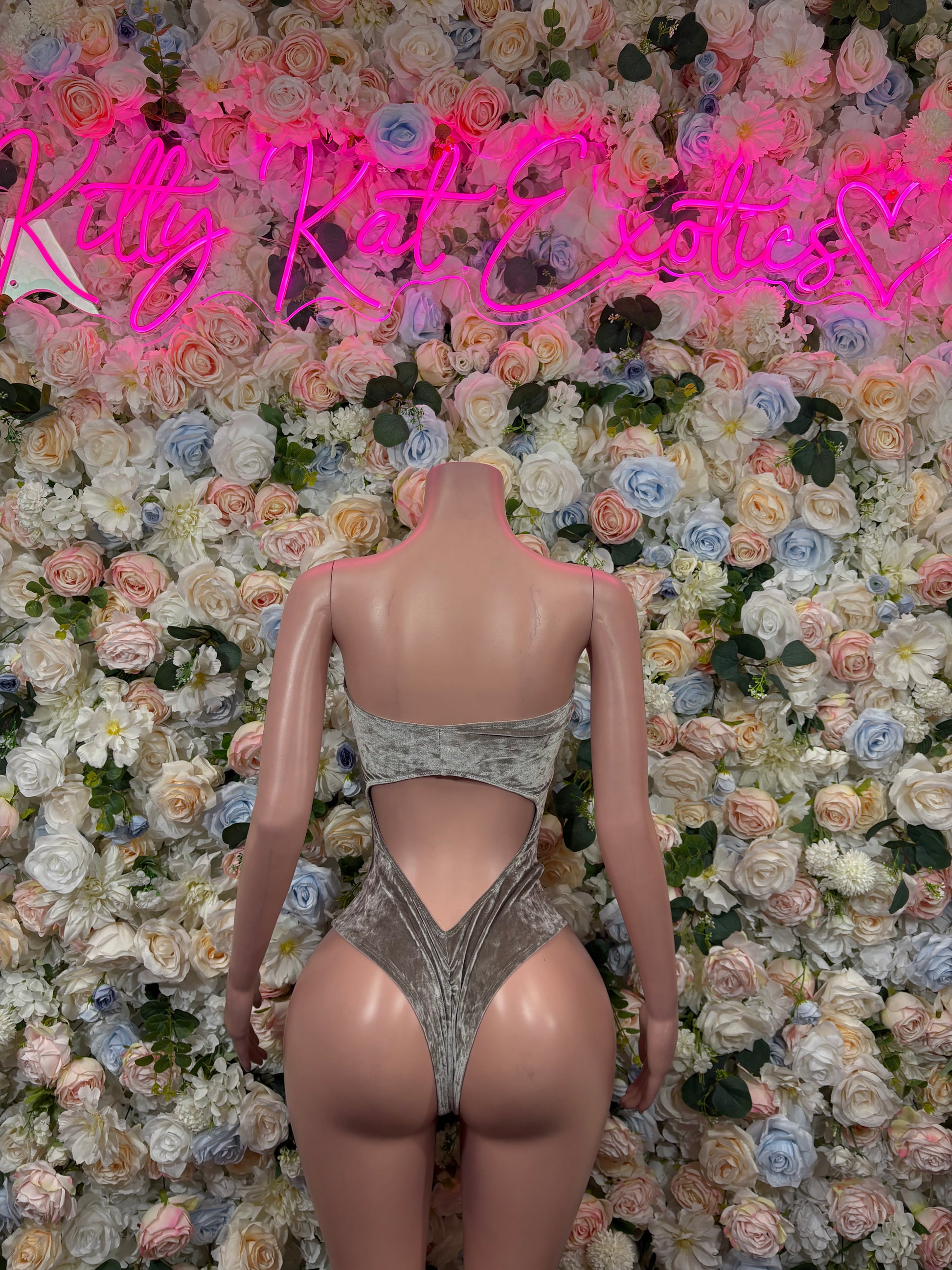 Sparkly silver-gray velvet bodysuit with back V-cut and high straps.