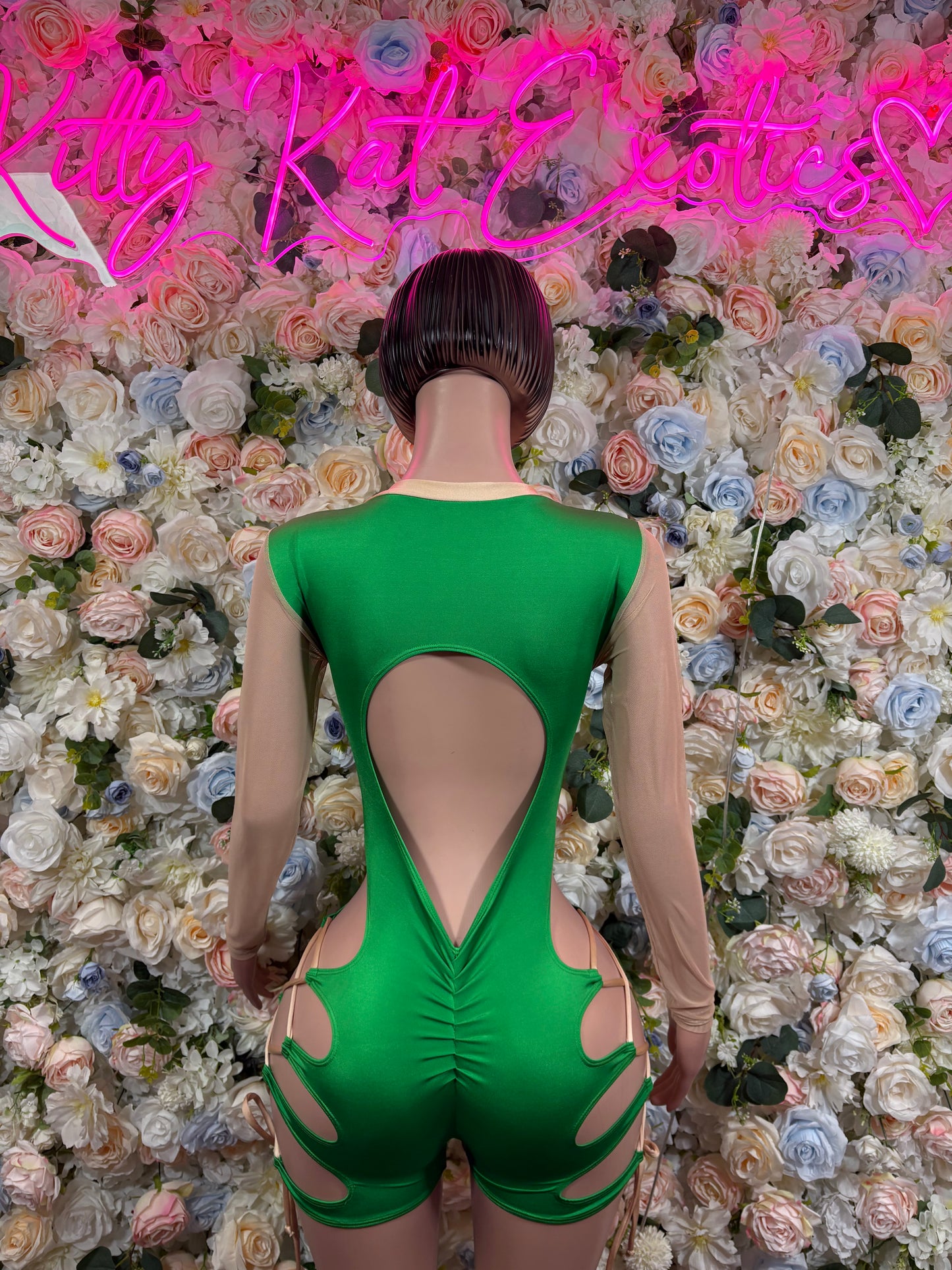 Green backless bodysuit with crisscross lace and teardrop back cutout