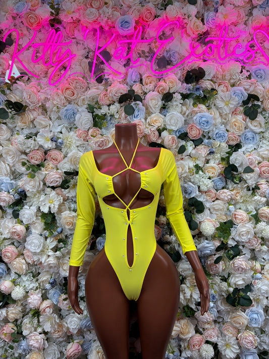 Neon yellow long-sleeve bodysuit with deep chest cutout and thin straps