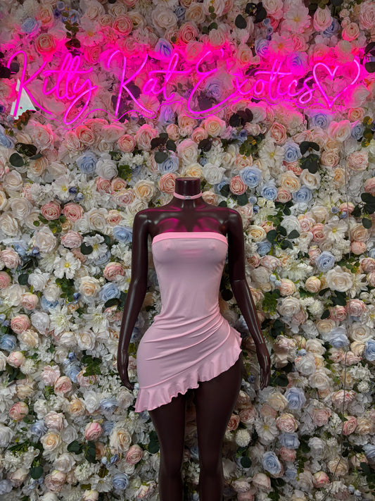 Light pink mini dress, ruched bodice and ruffled hem, sleeveless (front view)