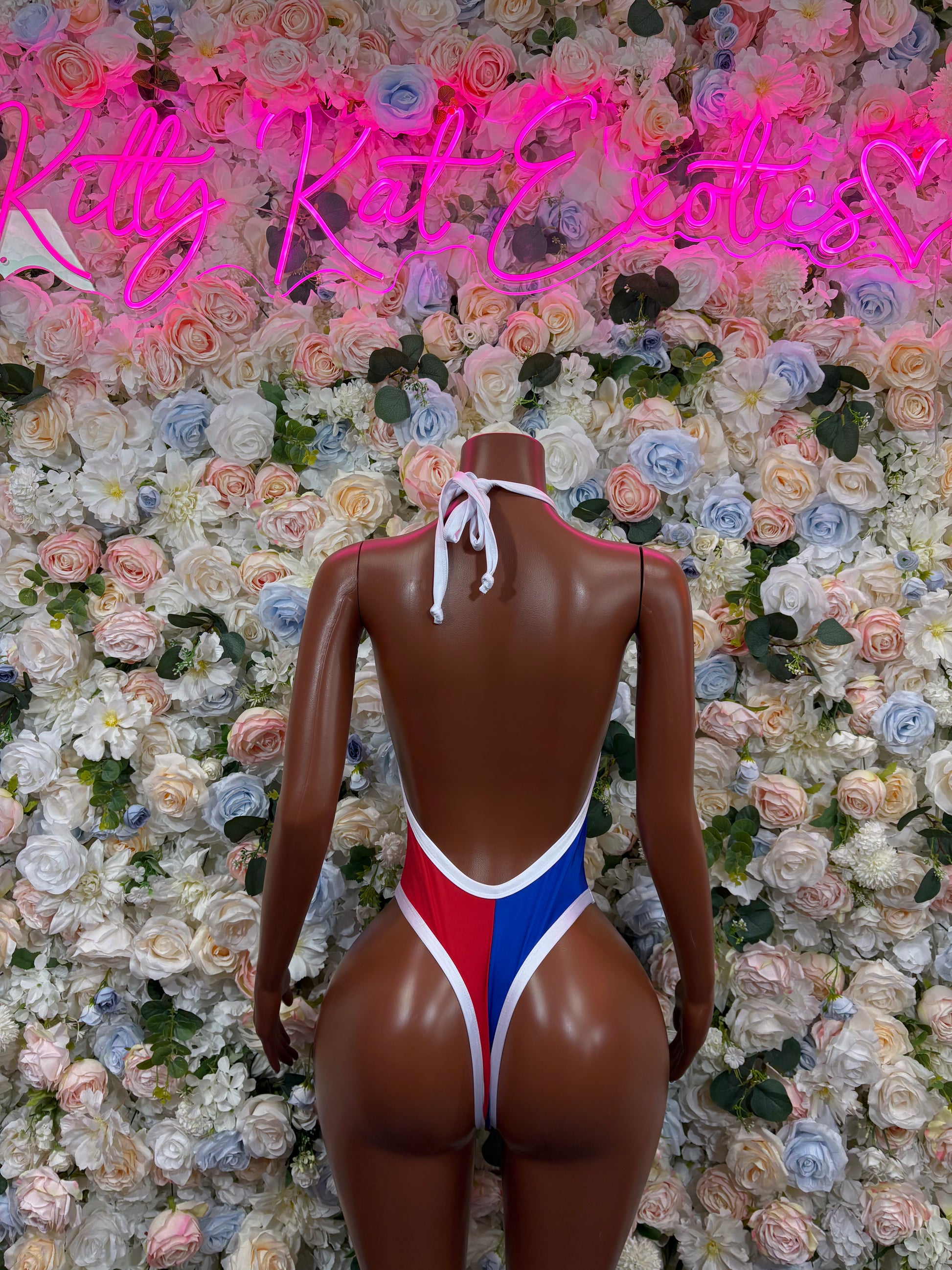 Tri-color halter bodysuit with open back and red, blue, white straps