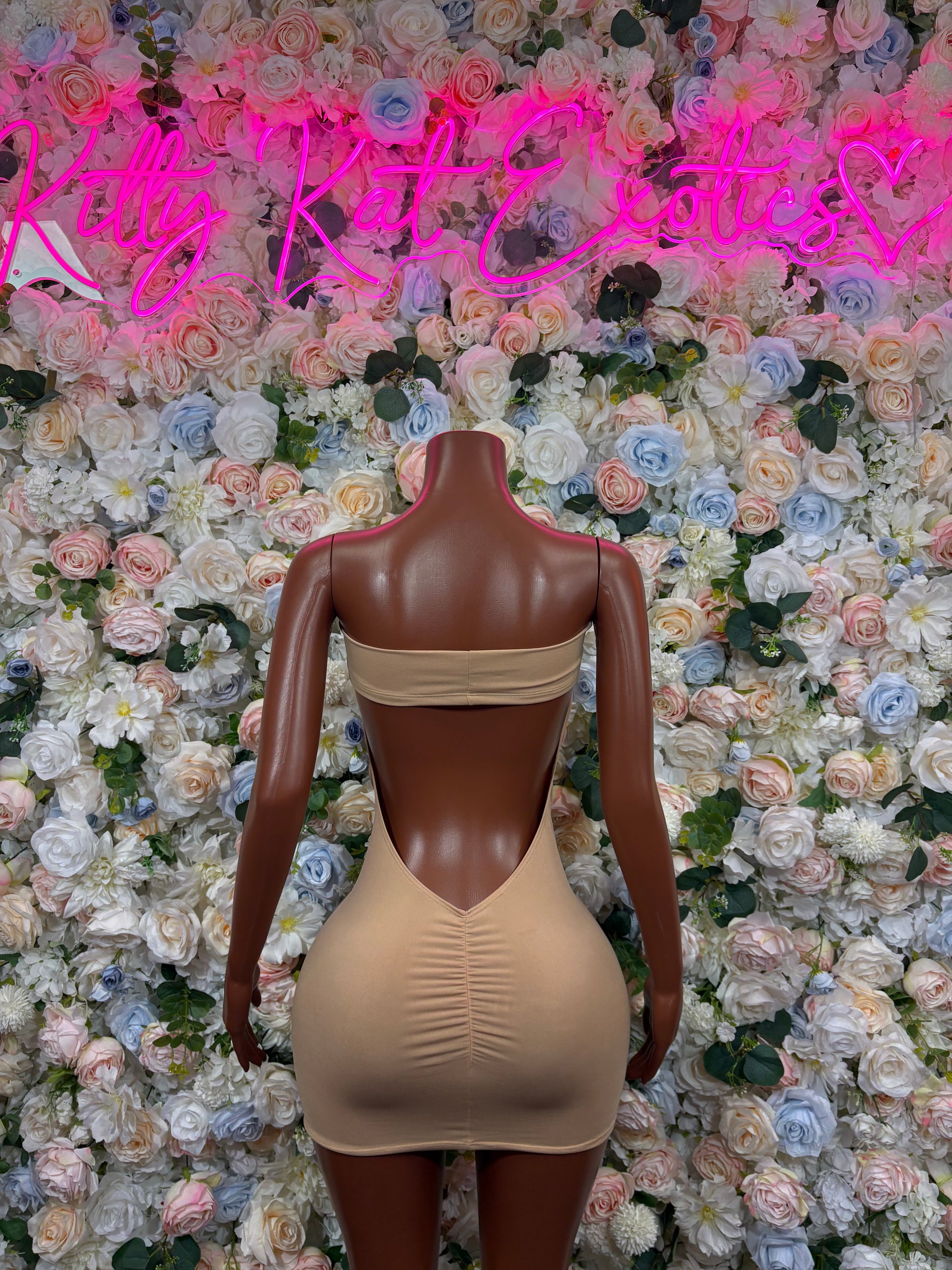 Light beige low-back bodycon dress with thin straps