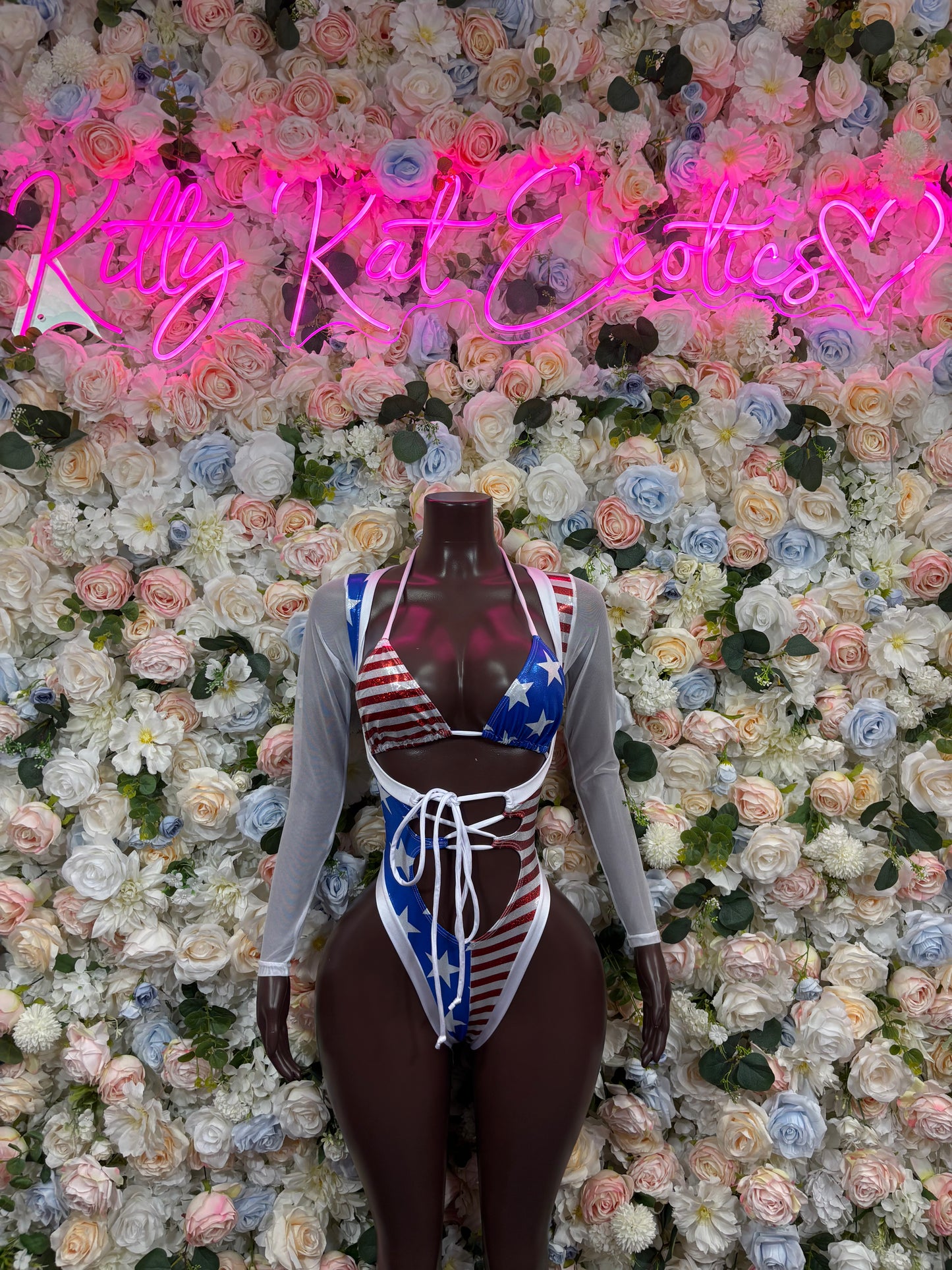 US flag bodysuit with long sleeves, star-and-stripe V top and lace-up front