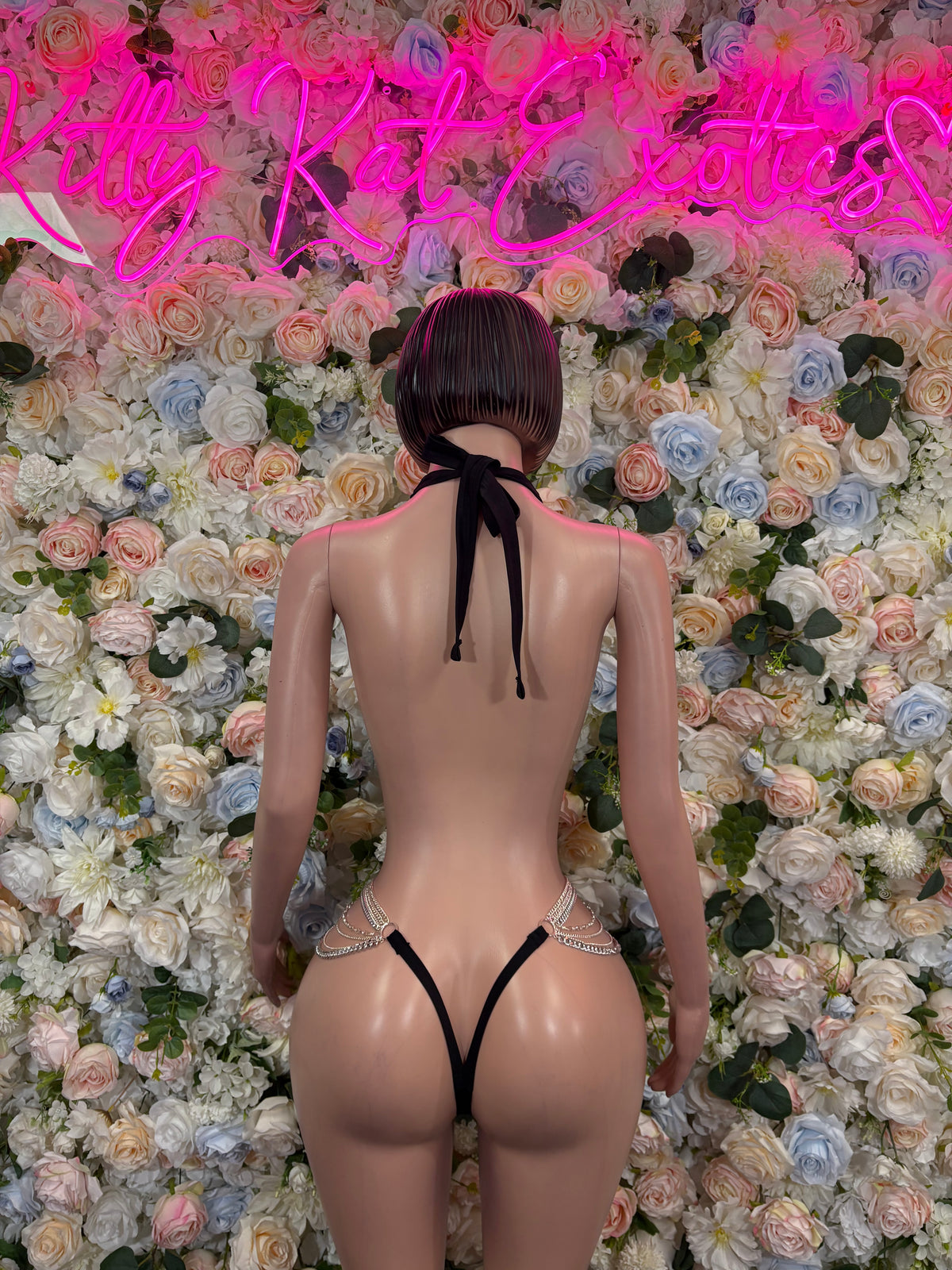 Black slingshot bodysuit with back tie straps and thong back