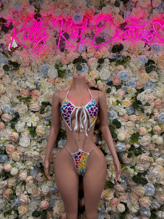 Two-piece bodysuit set with multicolor heart print, halter neckline and hip ties