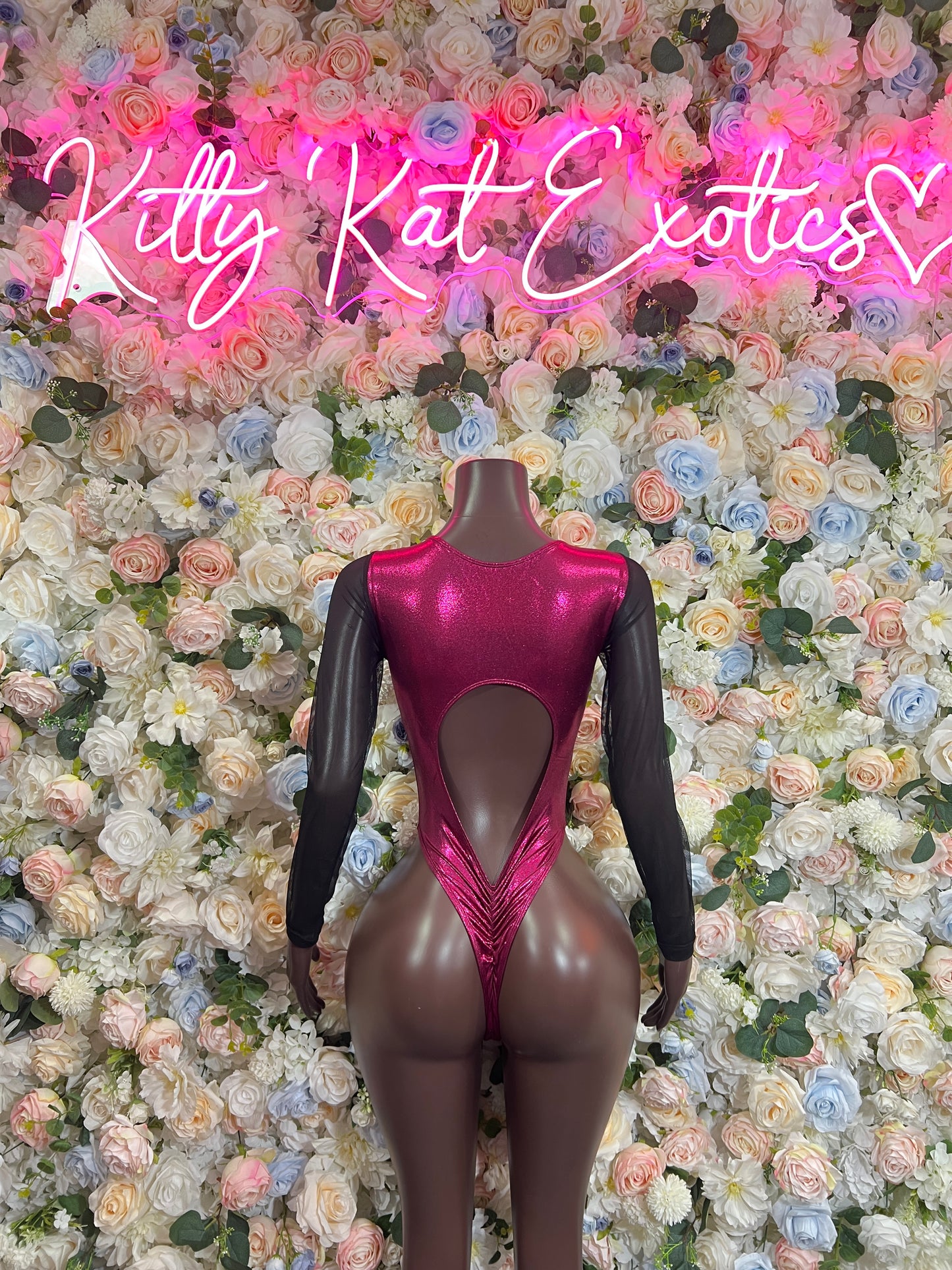 Burgundy bodysuit with long sheer sleeves and heart-shaped chest cutout