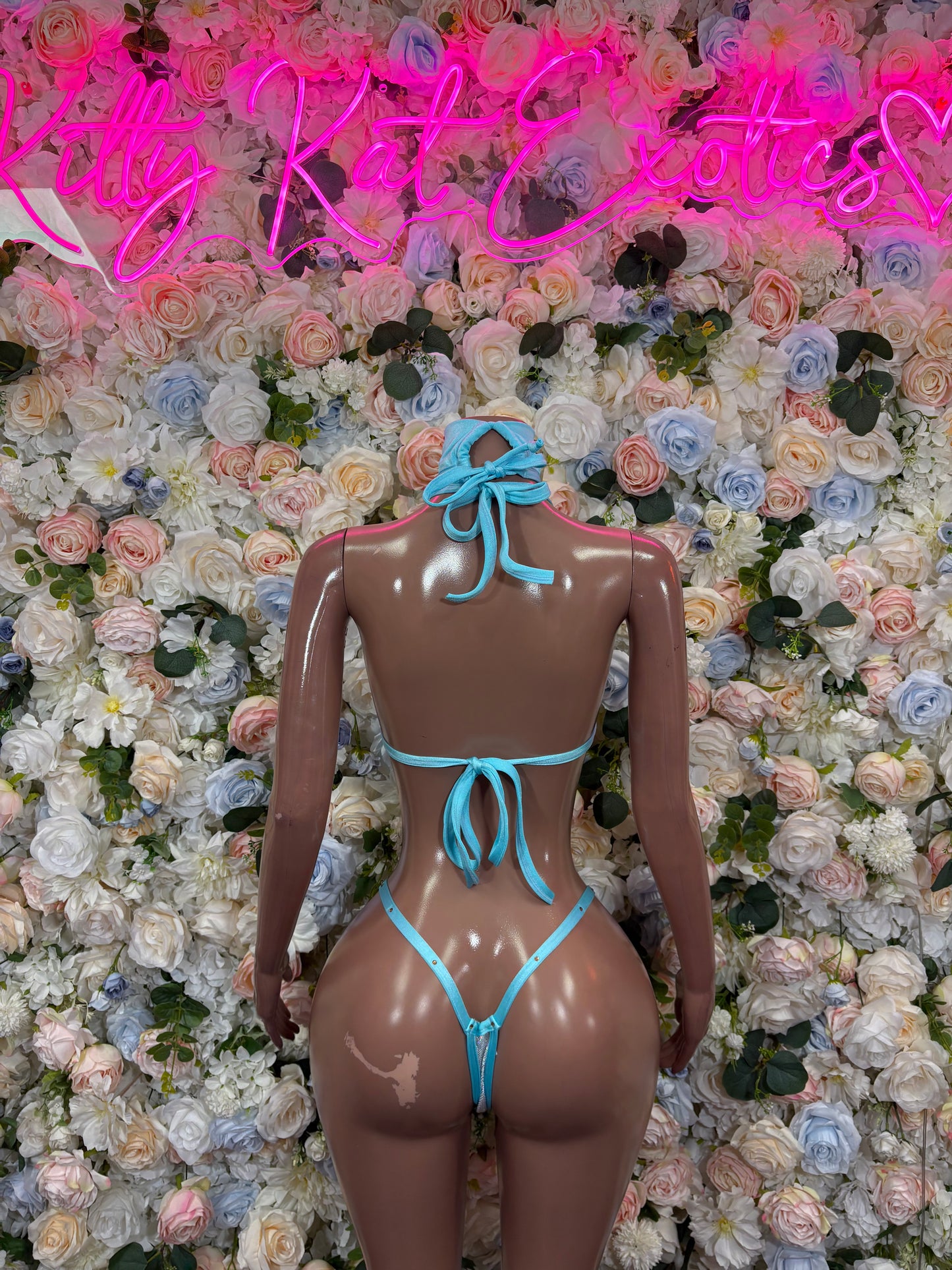 Light blue bikini set back view, bow-tie triangle top and tie-string thong bottoms