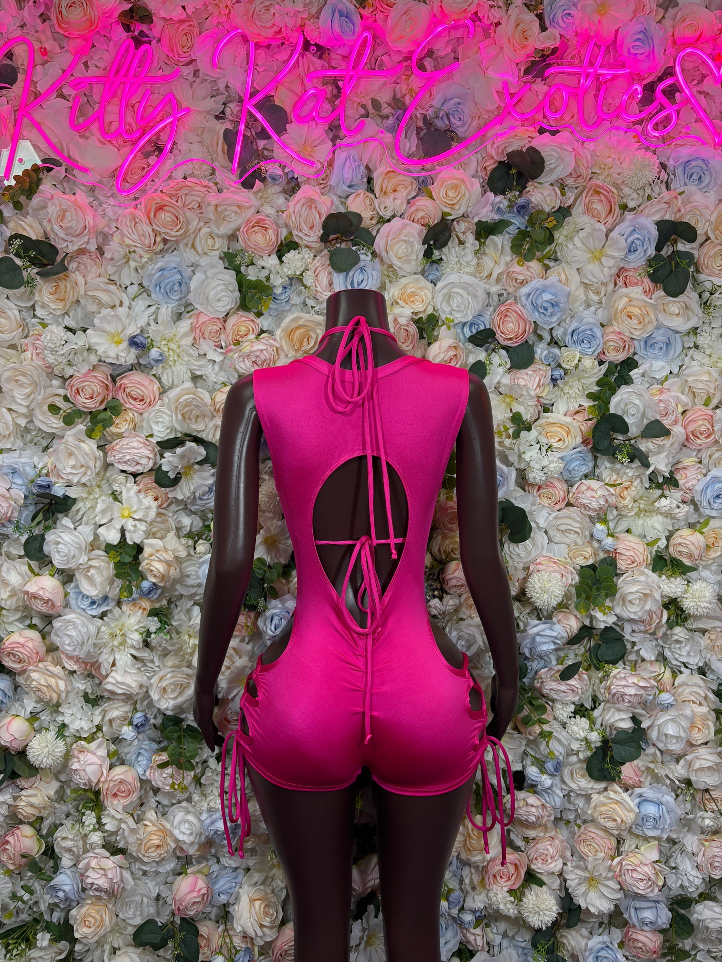 Pink strappy lace-up backless one-piece bodysuit with center drawstring