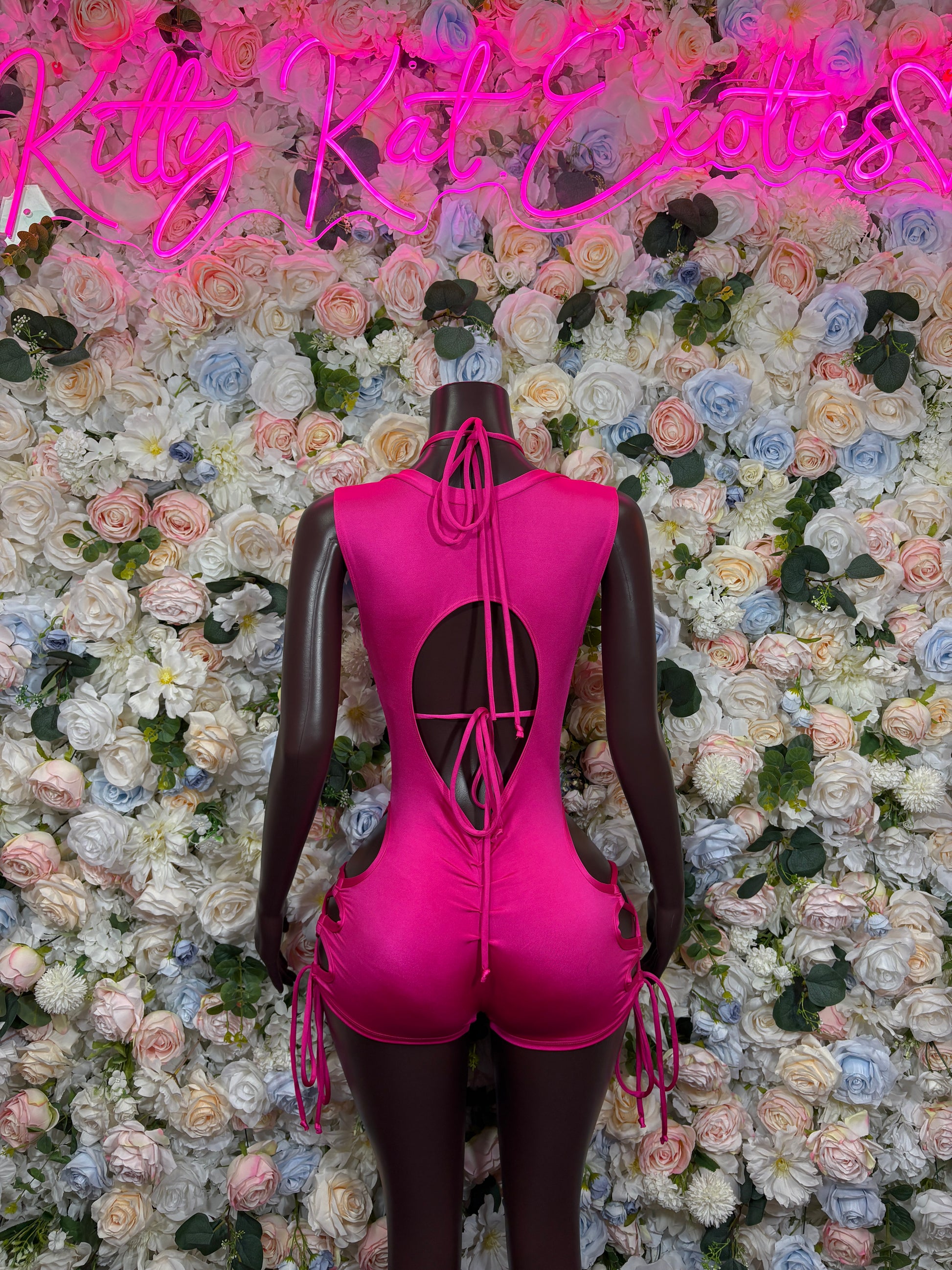 Pink strappy lace-up backless one-piece bodysuit with center drawstring
